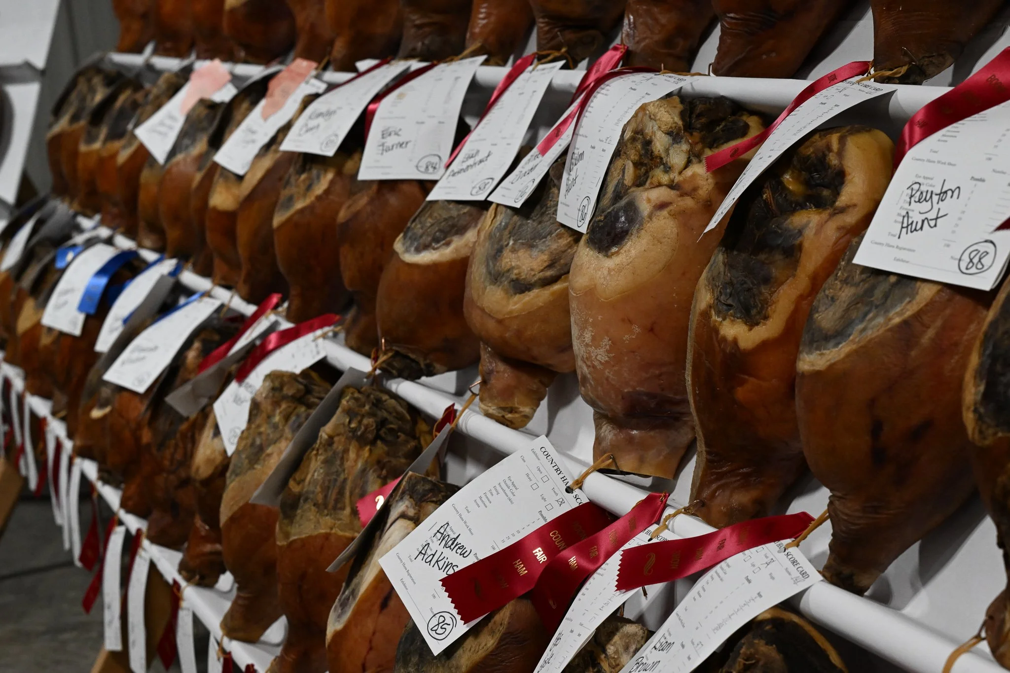Hams are lined up after judging in the exposition center of the Boone County Fair on Tuesday July 21, 2026, Northeast Regional Park in Columbia. The annual ham breakfast is scheduled for Saturday.