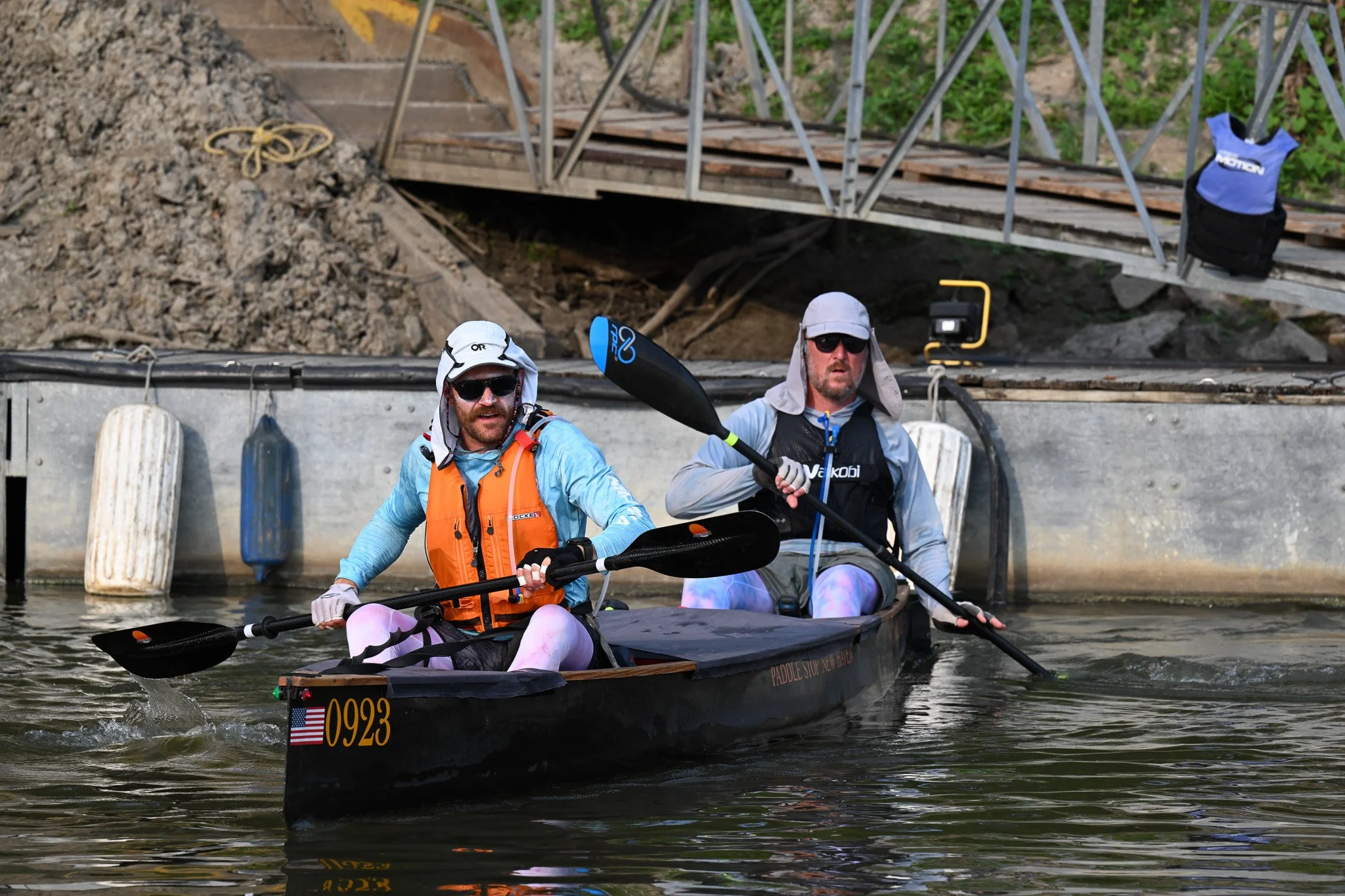 William Leonard, left, and Jared Zillig, both of Columbia, head back onto the Missouri River after their stop on Wednesday, July 29, 2026, at Cooper’s Landing in Columbia. Both Leonard and Zillig are participating in their first MR340 race.