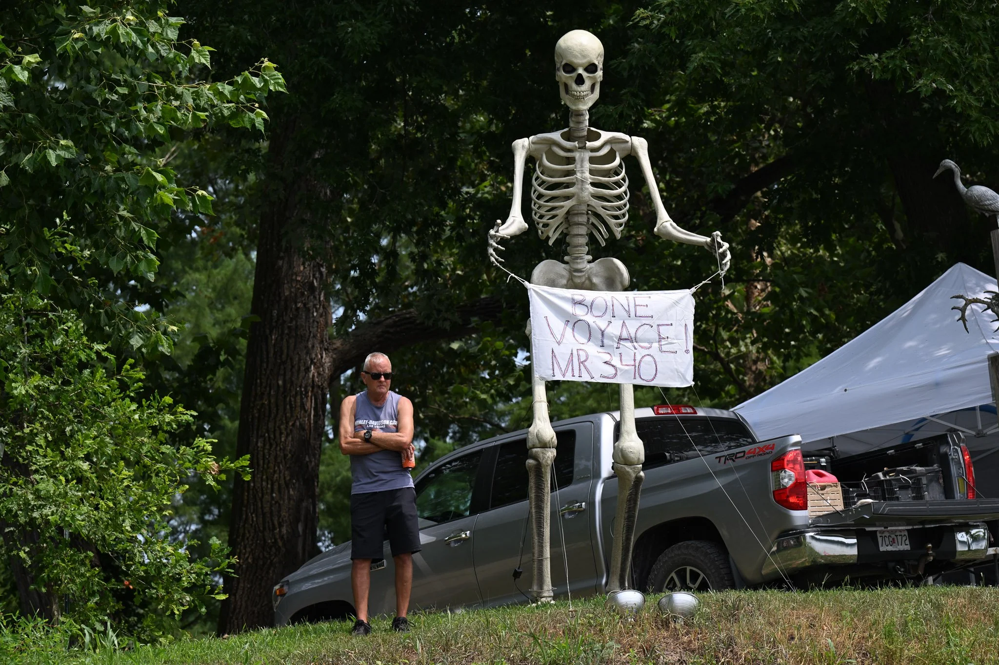 Mark McGee watches racers in the MR340 from the bank of the Missouri River on Wednesday, July 29, 2026, at Cooper’s Landing in Columbia. “Being a water enthusiast, I love people enjoying the river,” McGee said. “It brings a lot of good people togethe