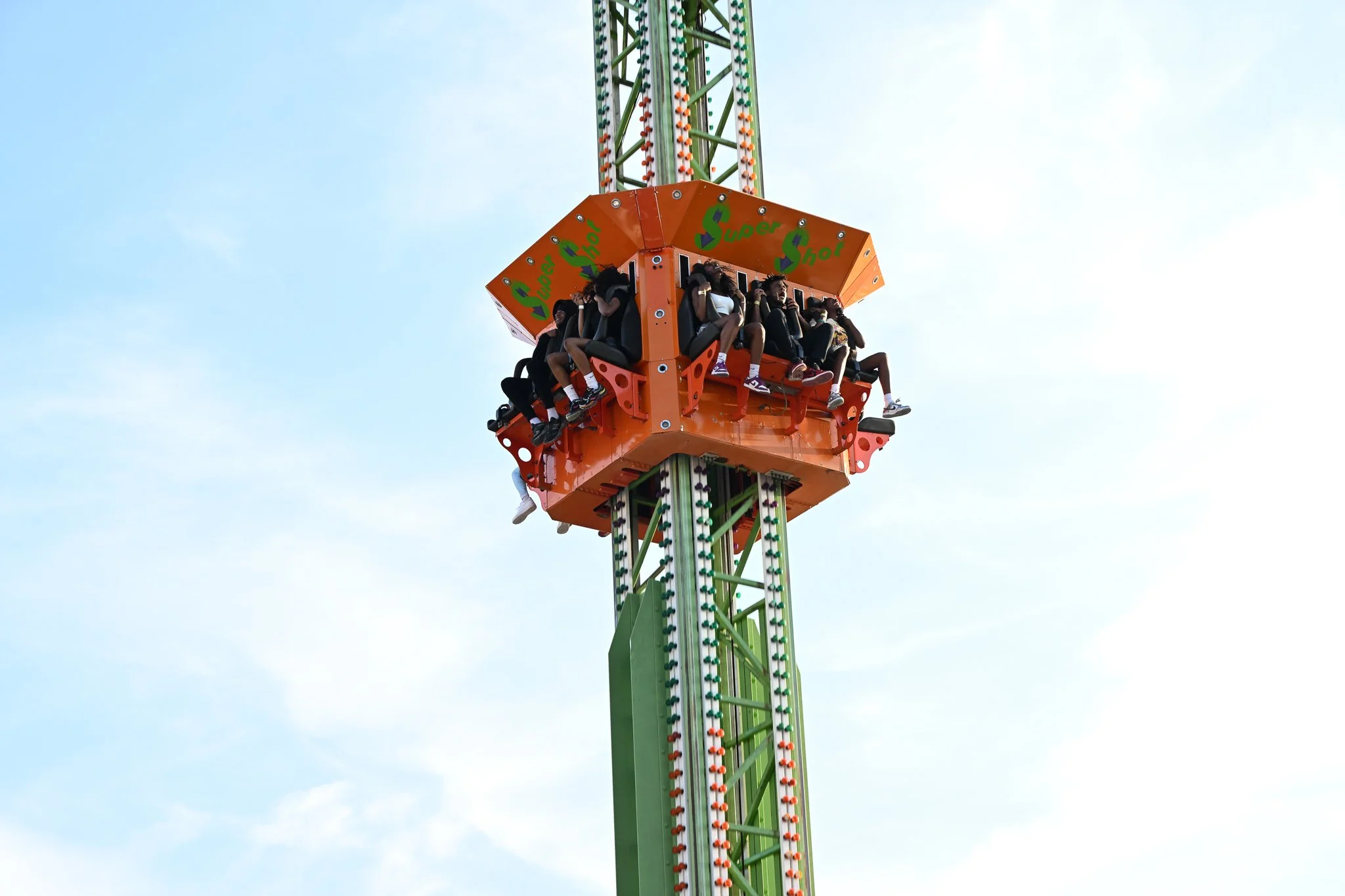 A group of the fair goers get ready to take the plunge on the drop tower at the Boone County Fair on Tuesday July 21, 2026, Northeast Regional Park in Columbia. Carnival rides open everyday at the fair at 6 p.m.