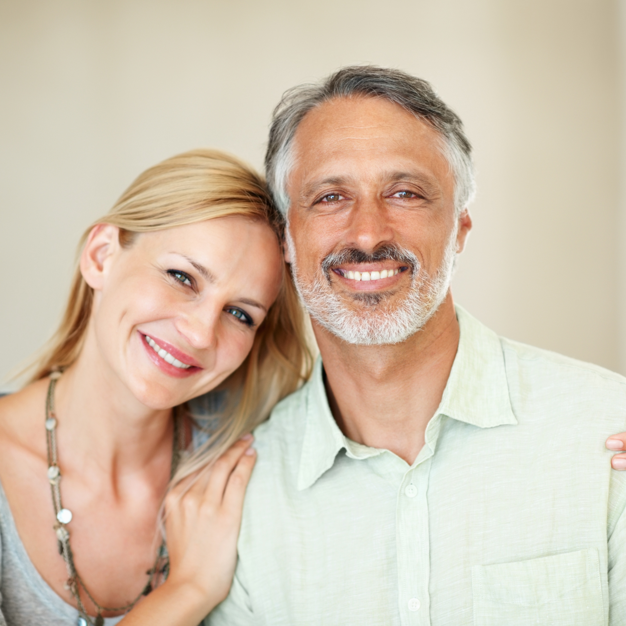 Smiling middle-aged couple close-up