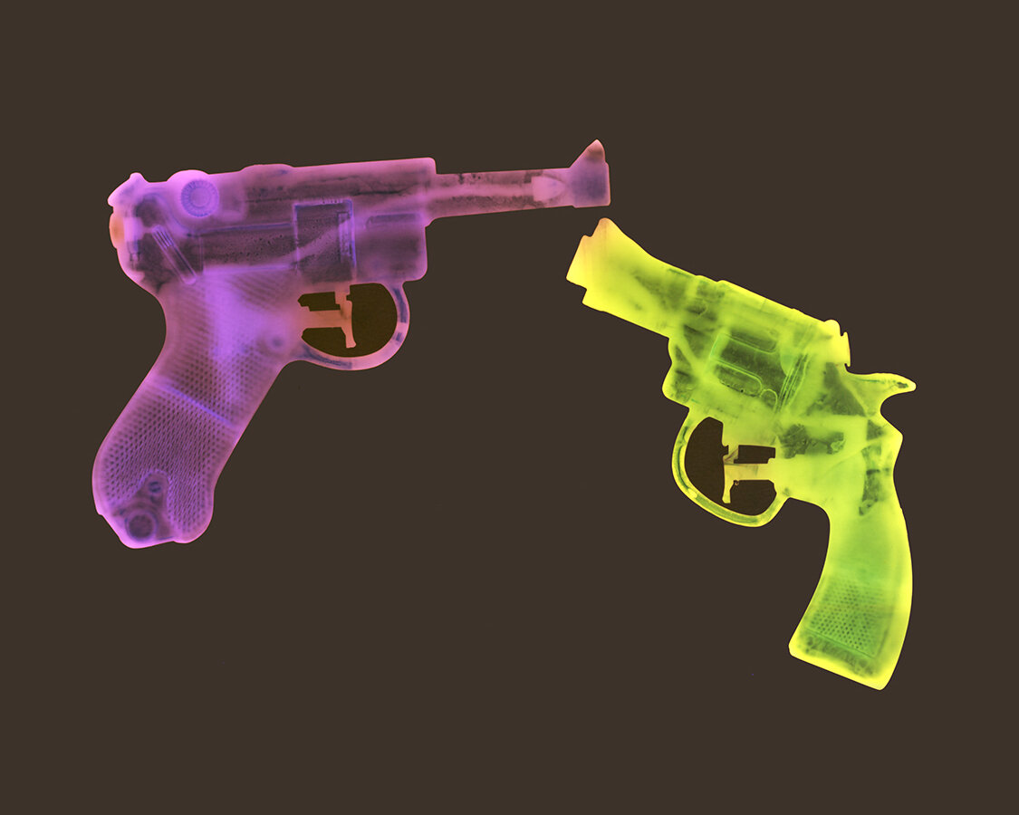 2 guns SMALL.jpg