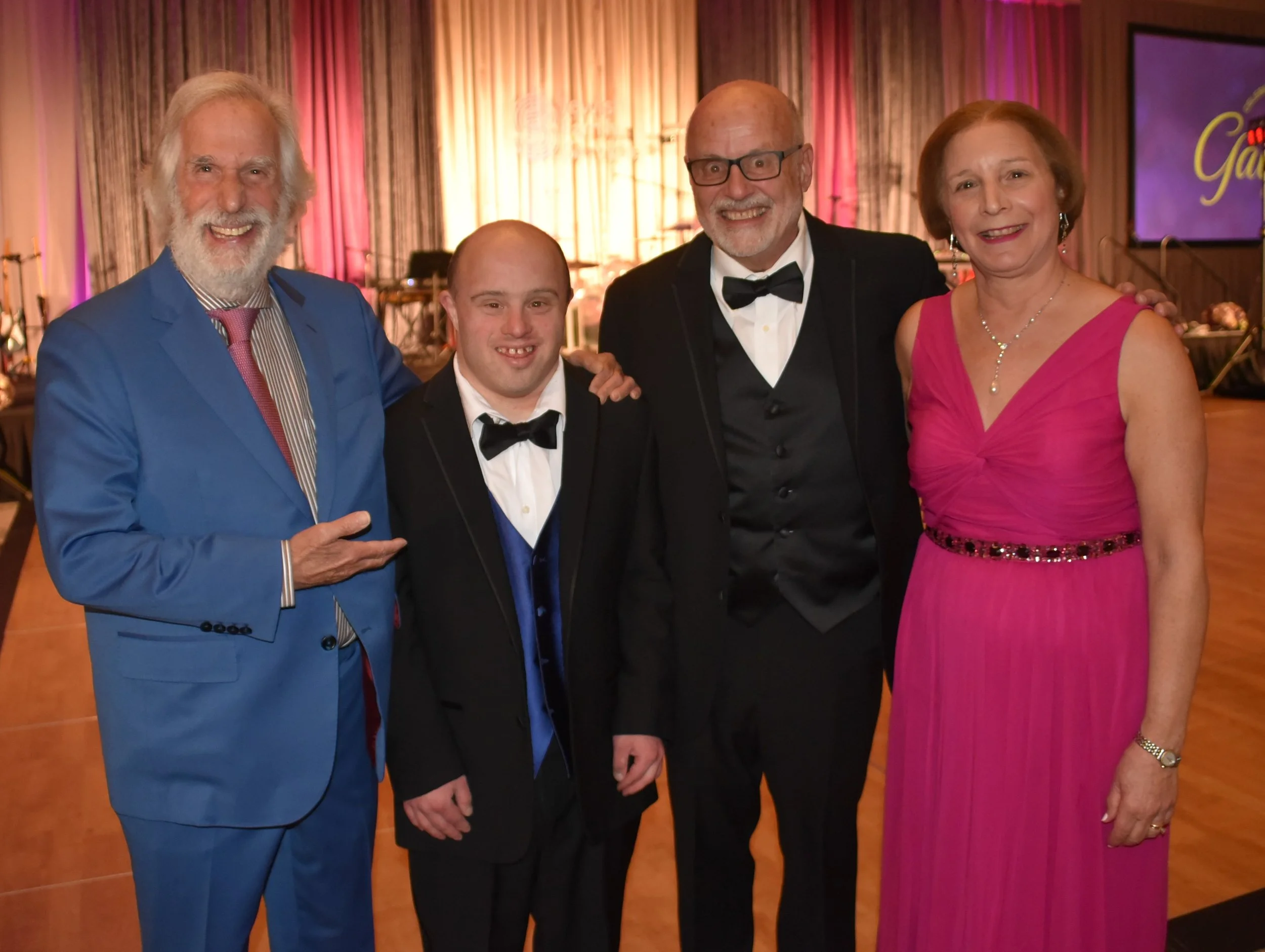 Henry with JFS CEO Linda Foster and family.JPG