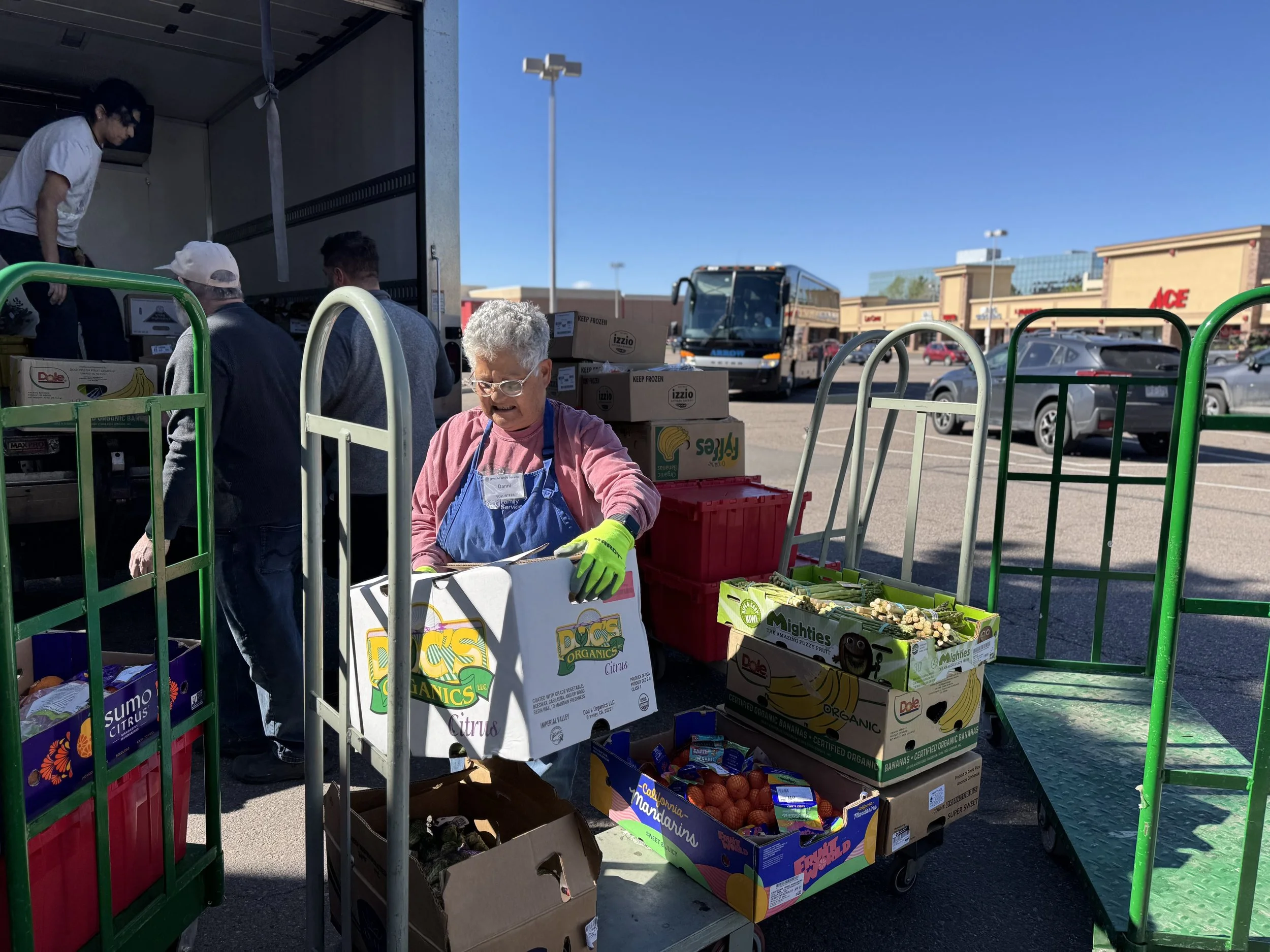 Volunteer loading boxes in Weinberg Food Pantry