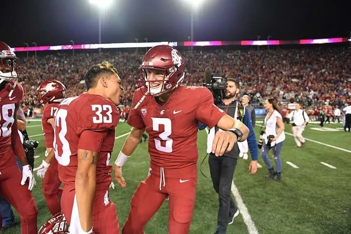 Gamecocks fans throw up three fingers in love, support