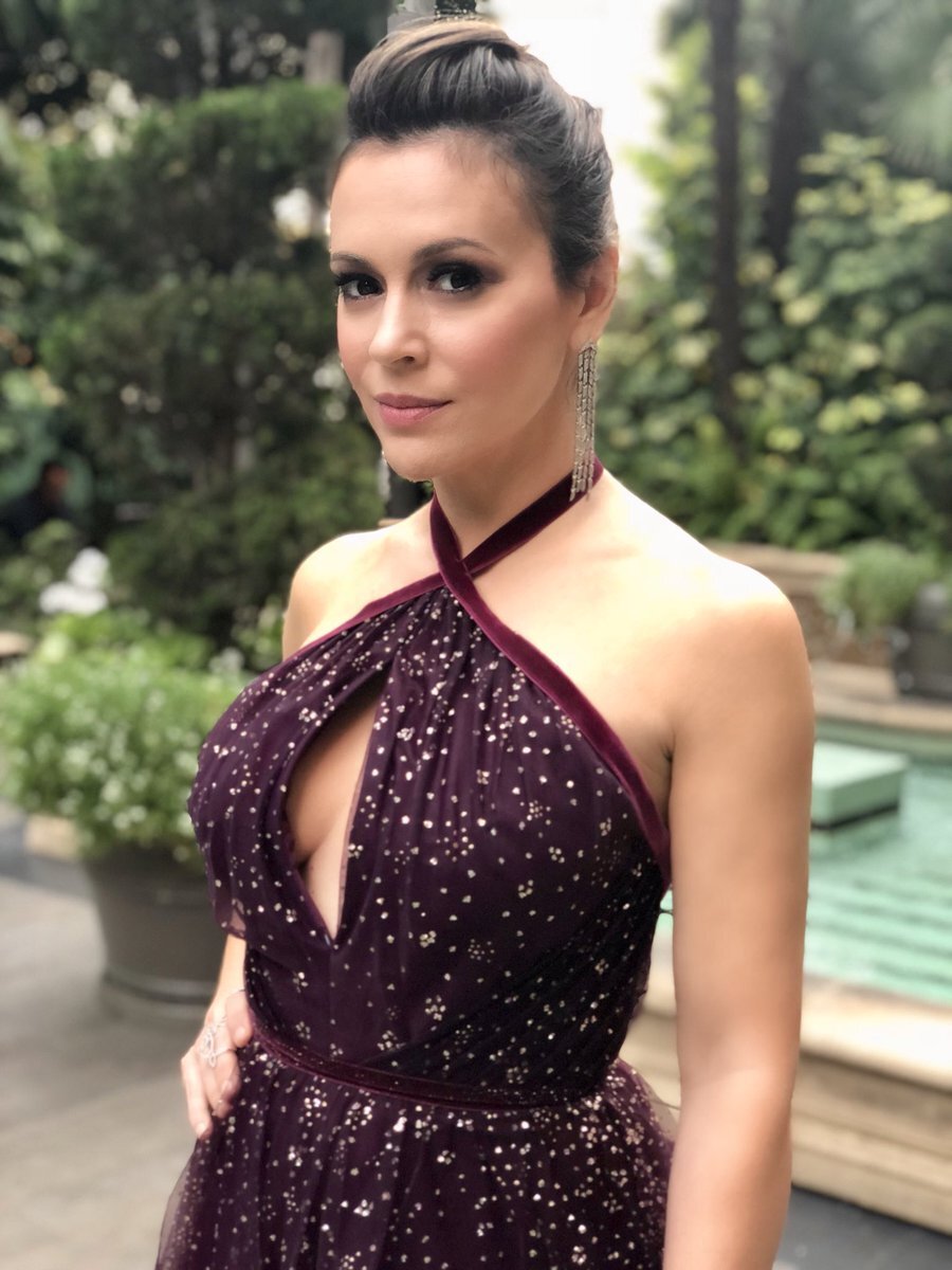  Actress Alyssa Milano At The Netflix Premiere Of "Insatiable" Wearing Marchesa Notte  