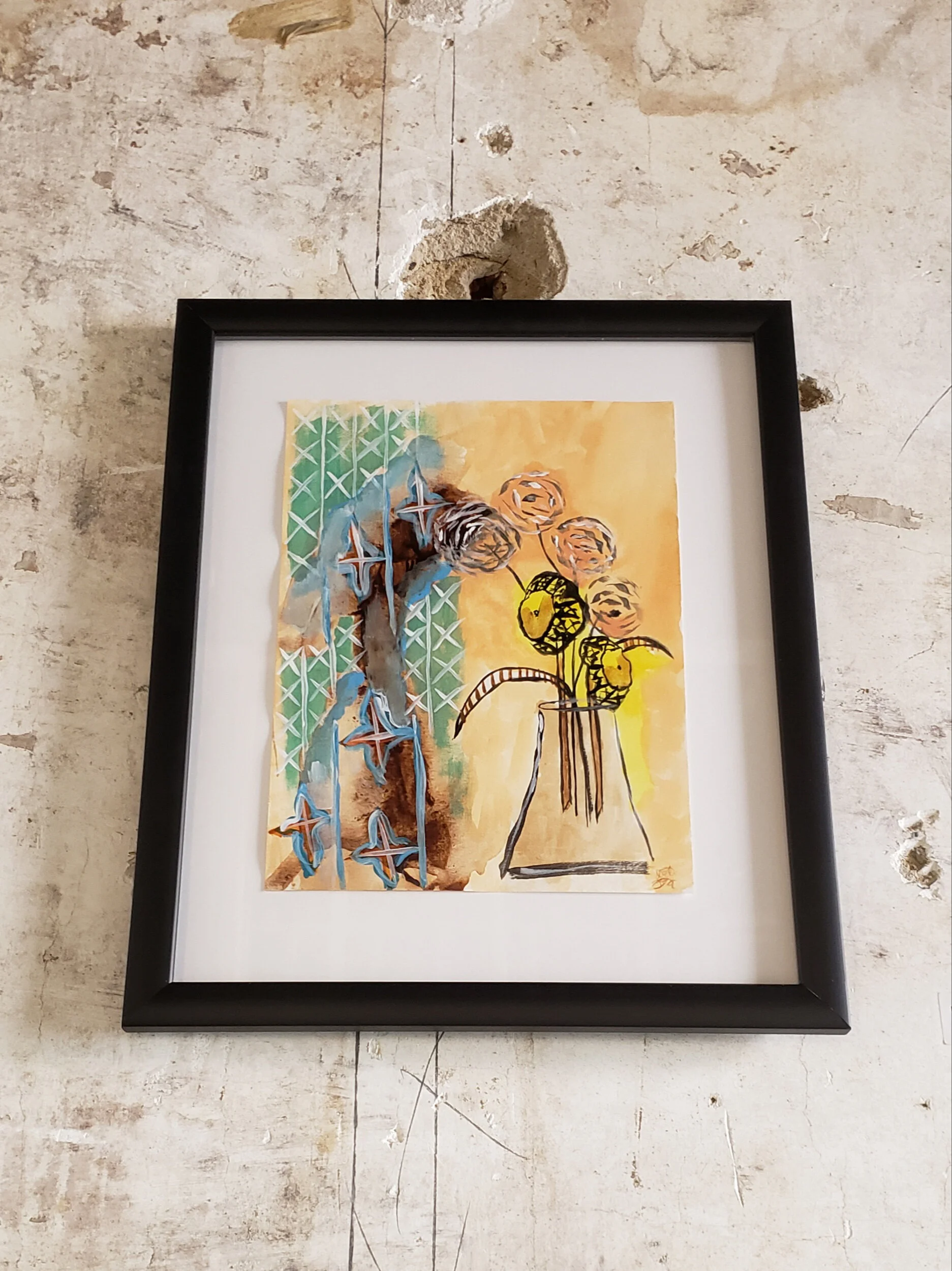 A framed watercolor painting of a vase with yellow flowers on a textured, yellow-orange background, hanging on a wall with peeling paint and exposed holes.