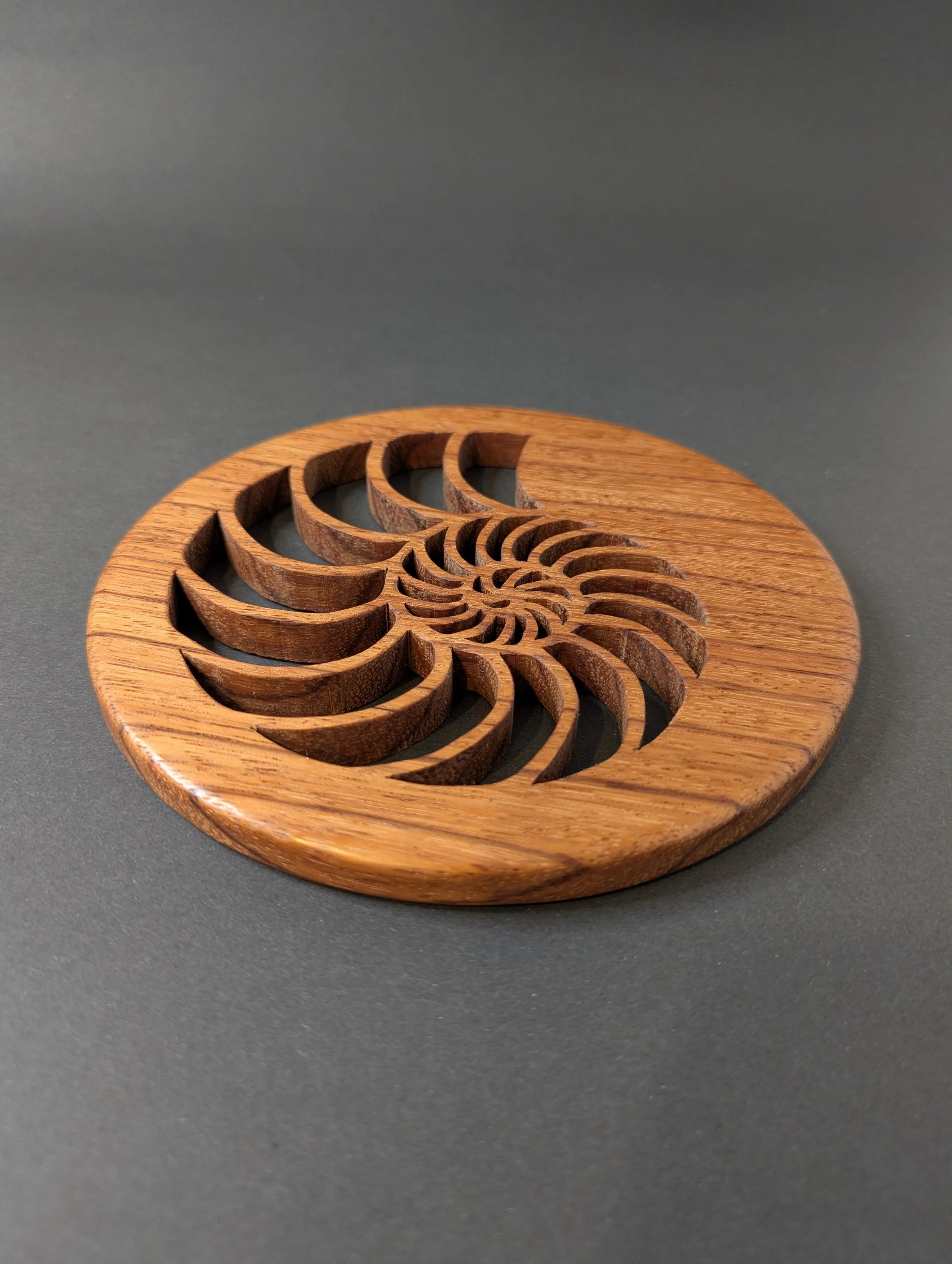 Image of a wooden trivet.