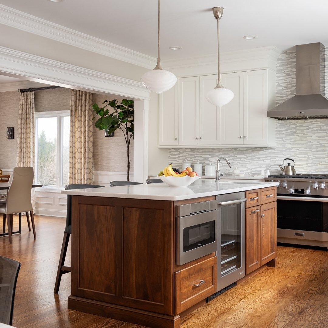 It's all about balance.  We love that the warm wood tones of the island and floor are the perfect contrast to the crisp white cabinets and the stainless steel appliances.

#diane_durocher_interiors
#newjerseydesign
#njinteriordesign
#homeinspiration
