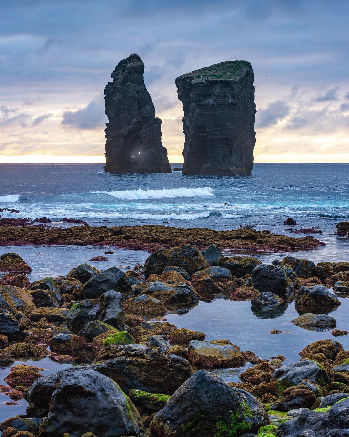 you can drive around this entire island in a matter of hours, but it&rsquo;s like driving around a whole country. rainforests, lakes, small mountains, cities, waterfalls, and black sand beaches #azores #portugal