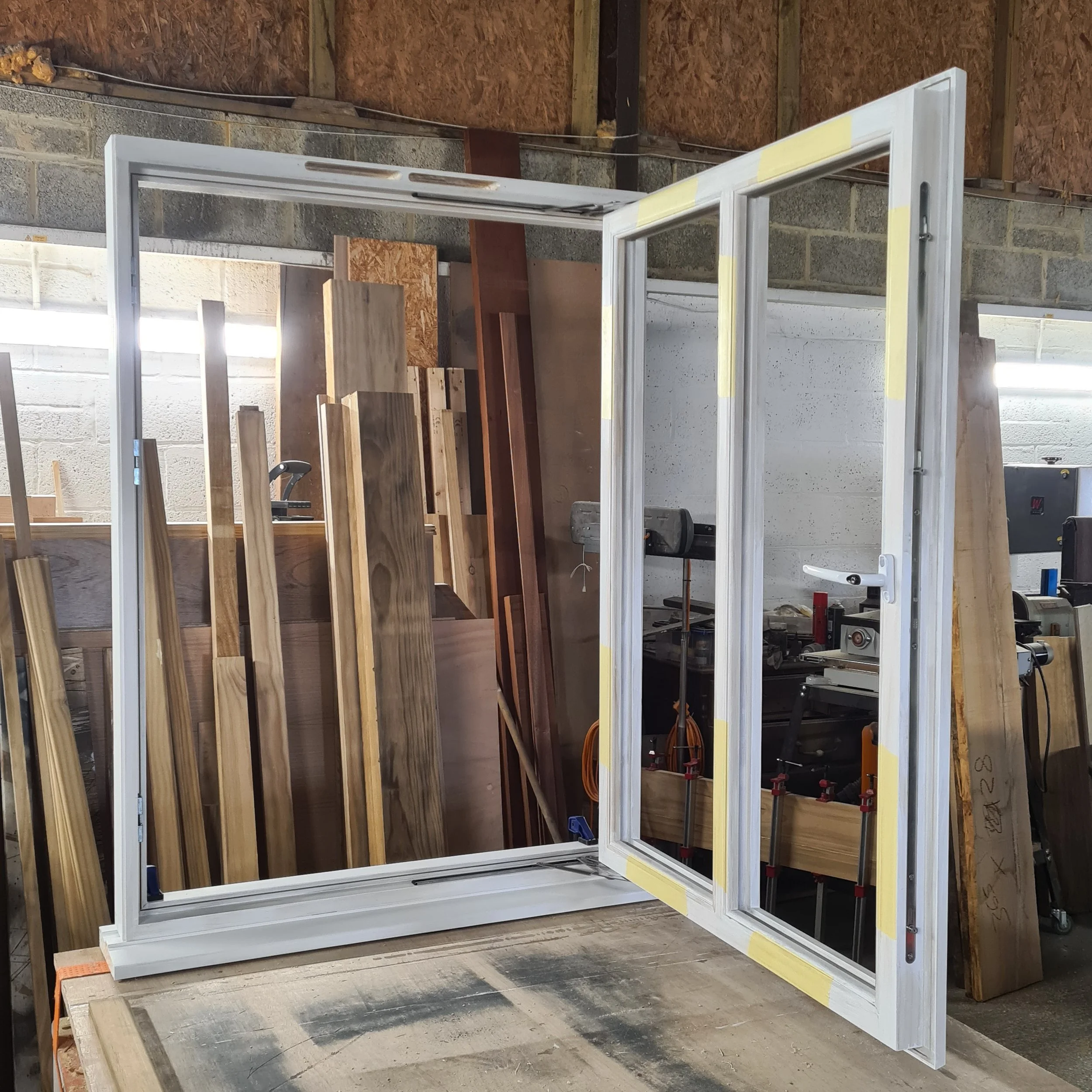 Window in a frame, showing hinges.