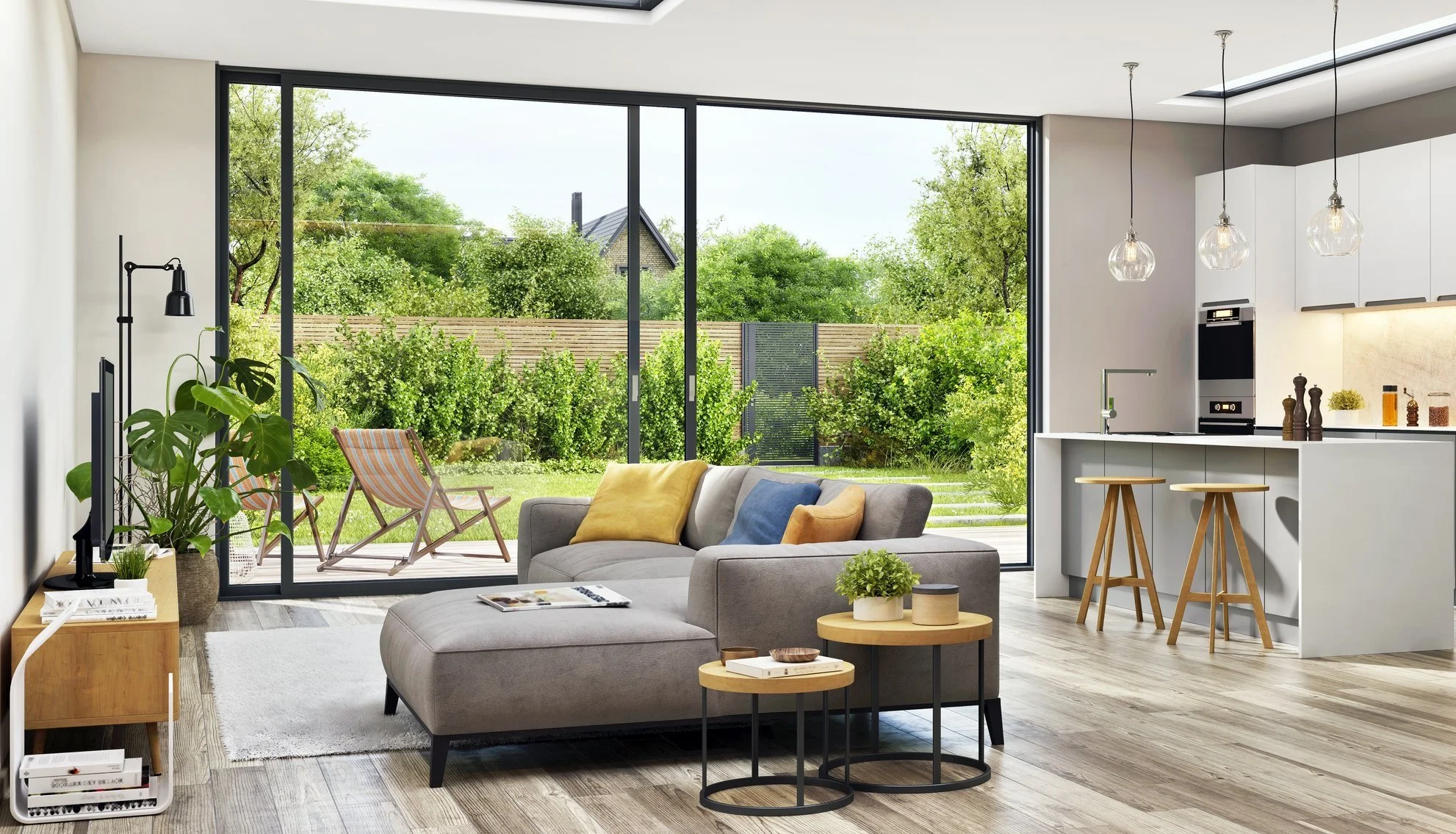 Modern indoor outdoor living room with floor to ceiling patio doors and unobstructed views of the garden