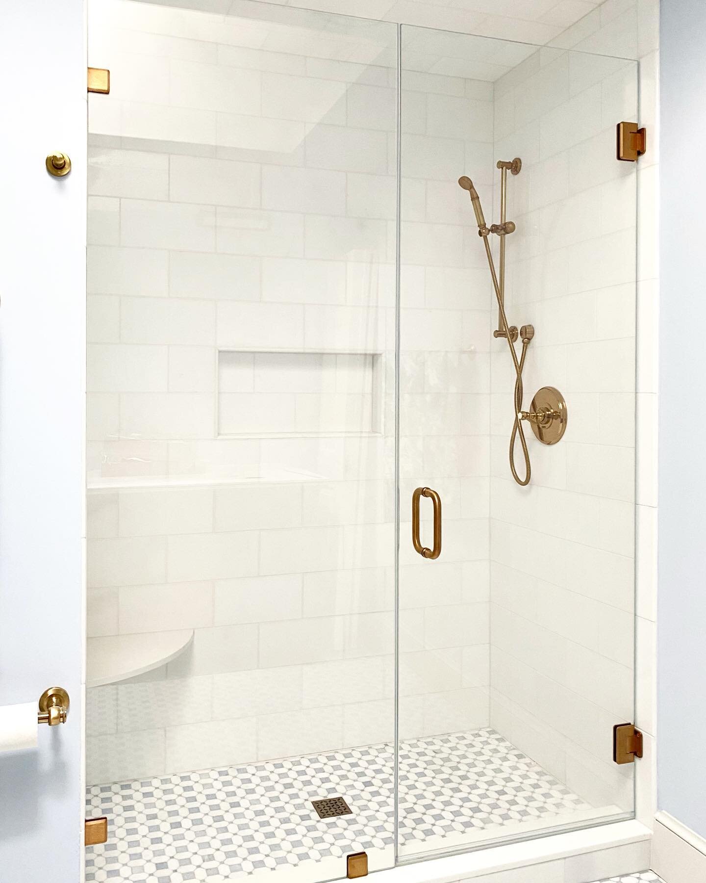 3/8&rdquo; Low Iron (ultra-clear glass) w/ satin brass hardware. Always a great glass selection when a light color tile is being used to get the best clarity of glass.