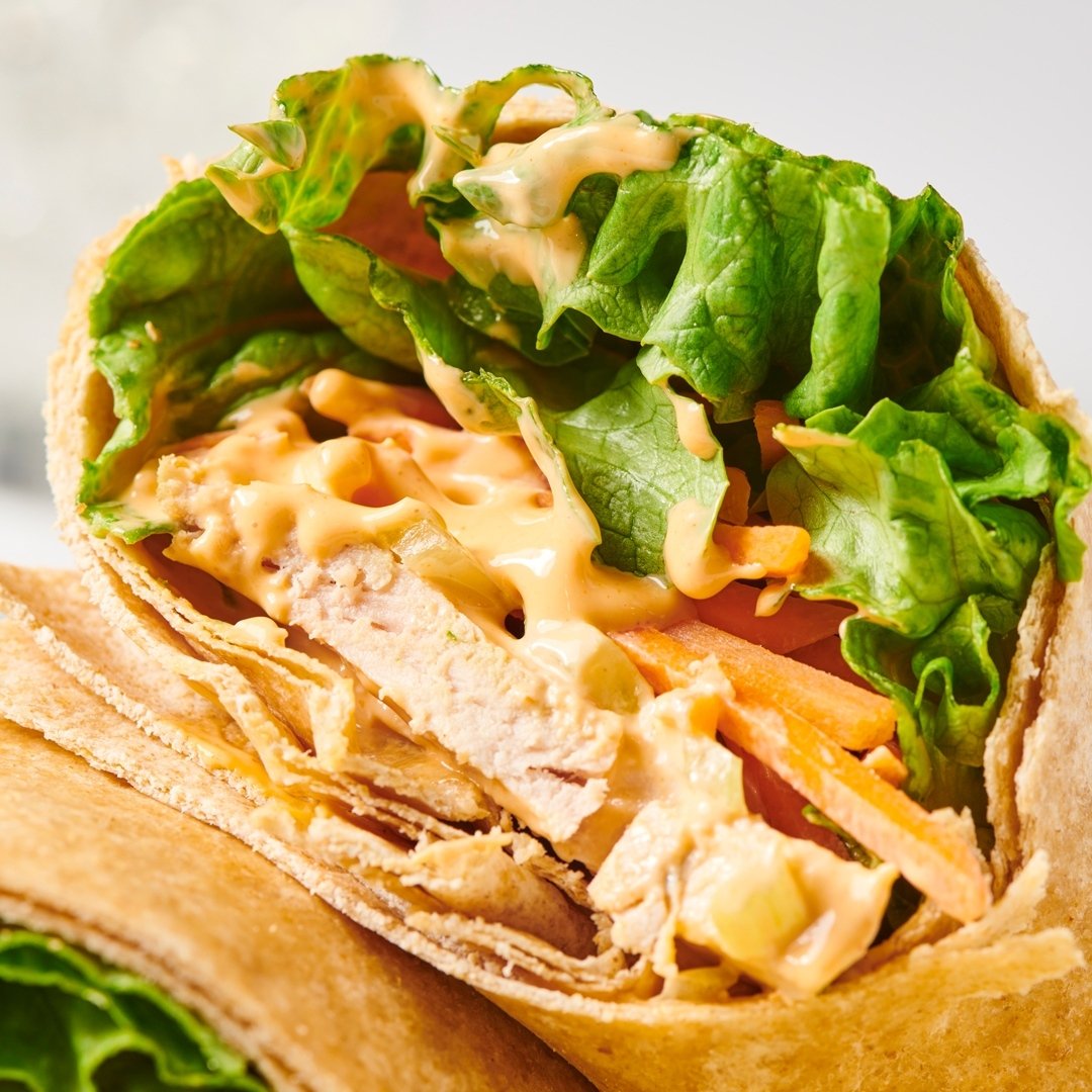 Grilled Buffalo Chicken Wrap ⁠
⁠
Grilled chicken, creamy buffalo dressing, carrot, celery, leaf lettuce, whole wheat wrap. ⁠
⁠
Available on a whole wheat or GF wrap. Vegetarian option available with tempeh. 10/23 to 11/2.⁠