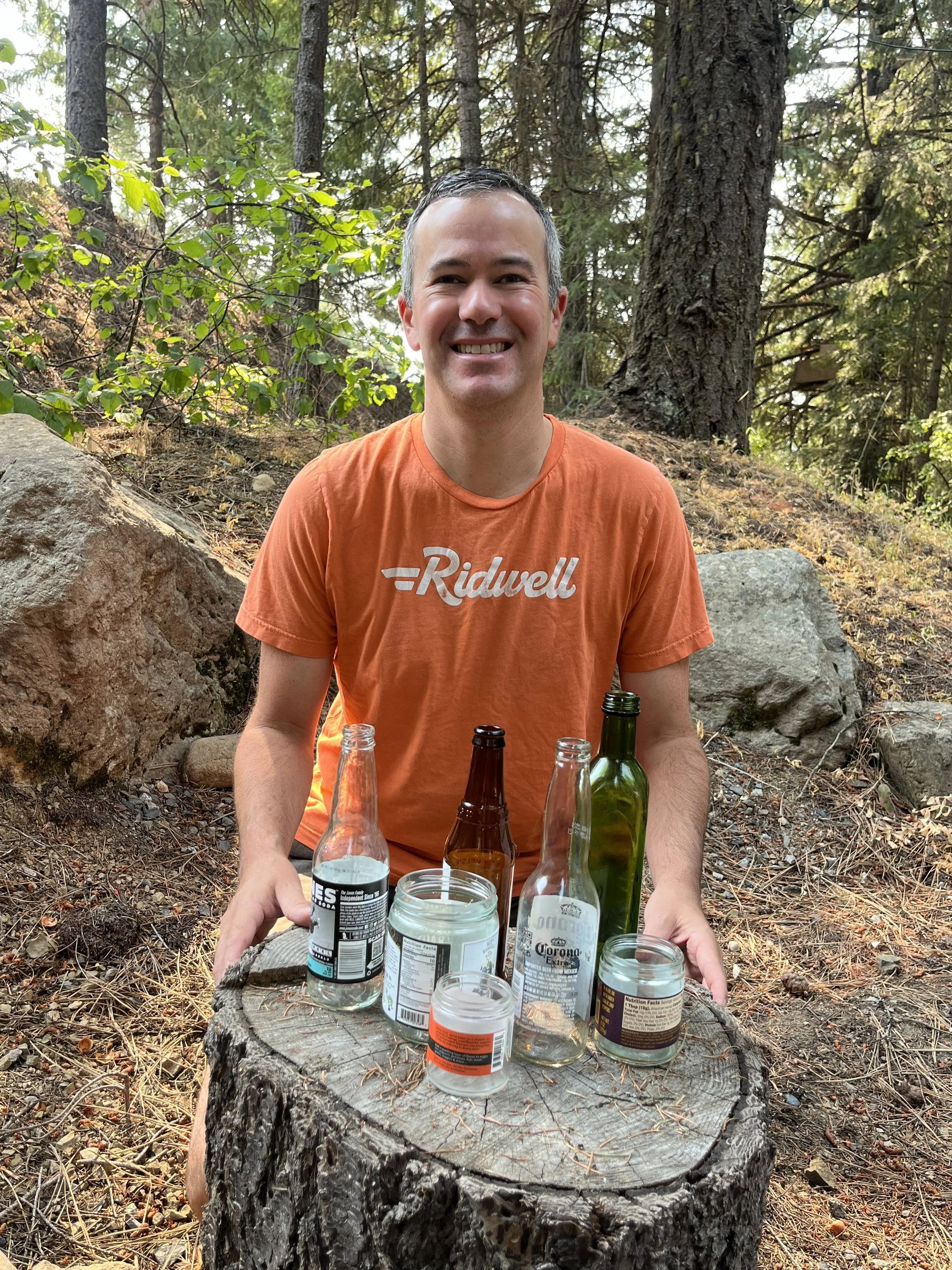 Ridwell founder with glass bottles