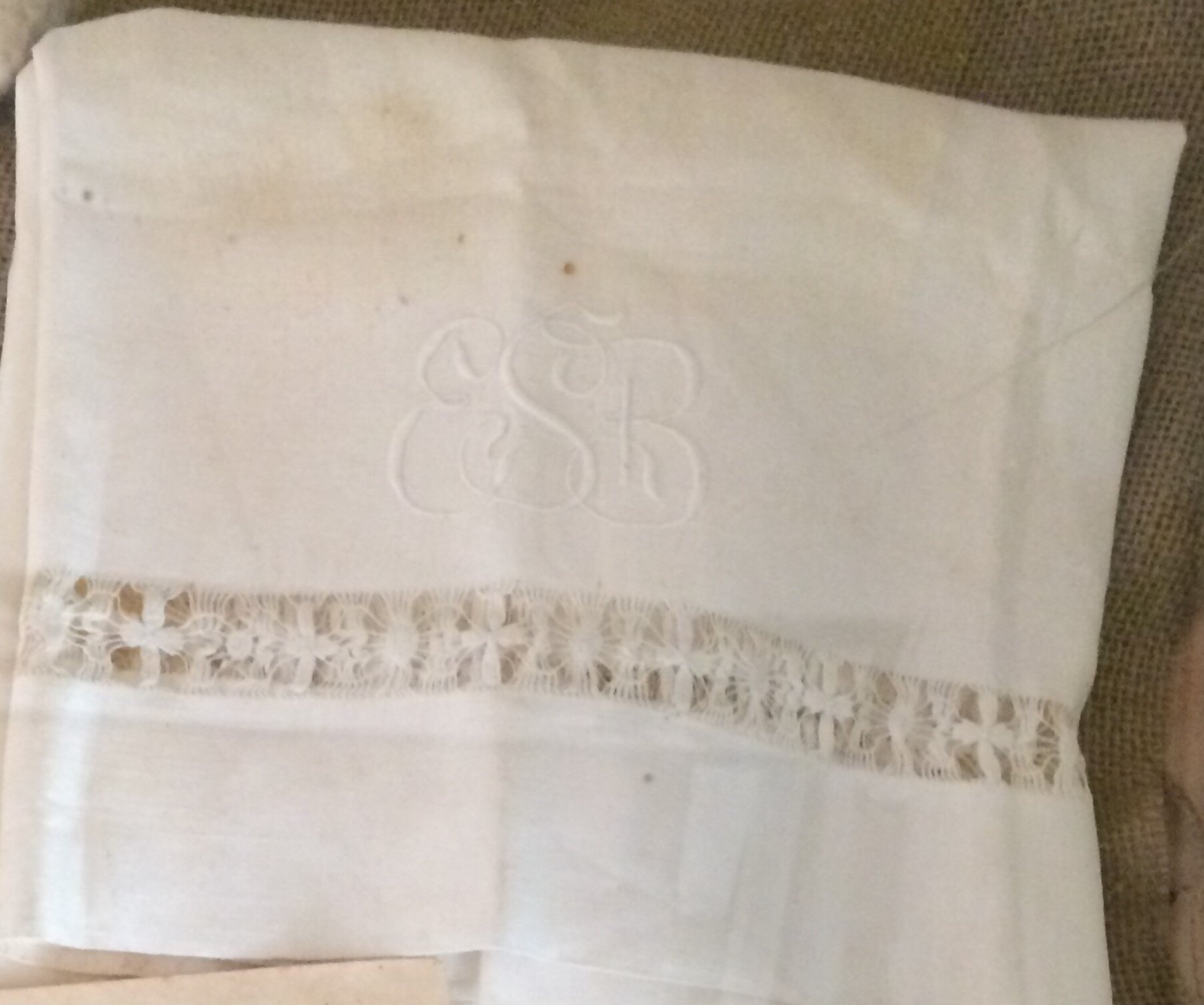  A napkin she edged and embroidered with initials ESB 