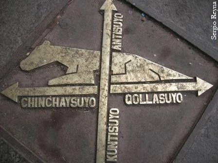 A plaque to show the center from which the four directions of the great Inca Trail, the "Qapac Ñan", radiate out to the four corners of the great Incan empire.