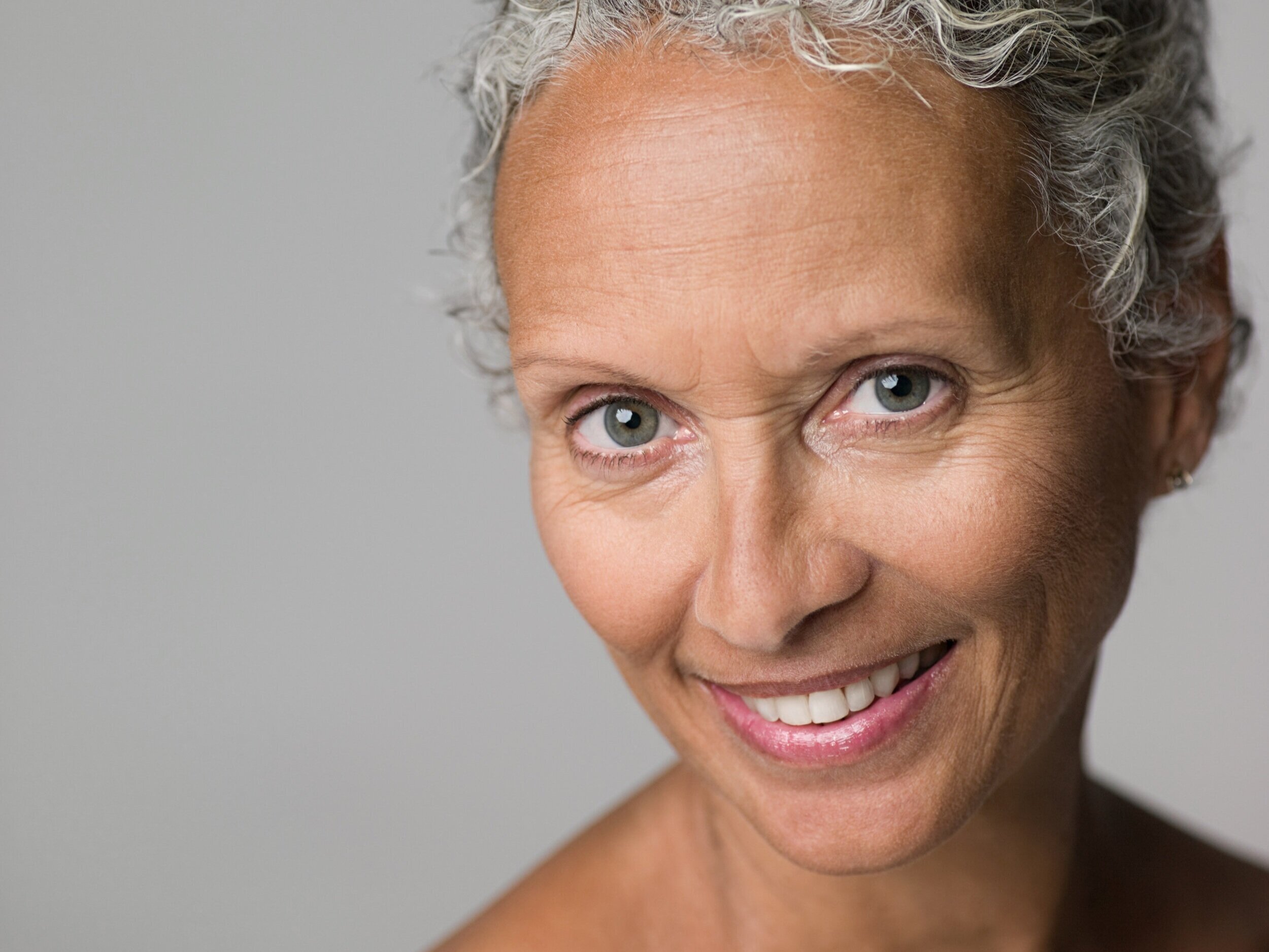 alt=older woman smiling