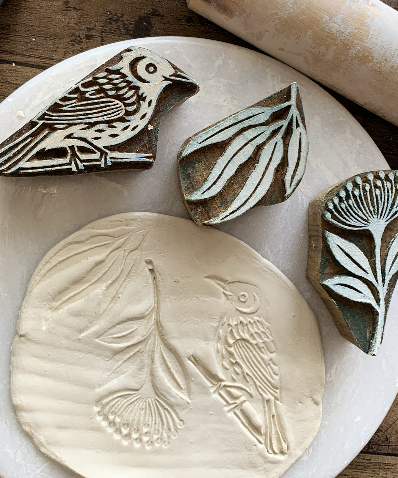 Clay dish with blocks.png