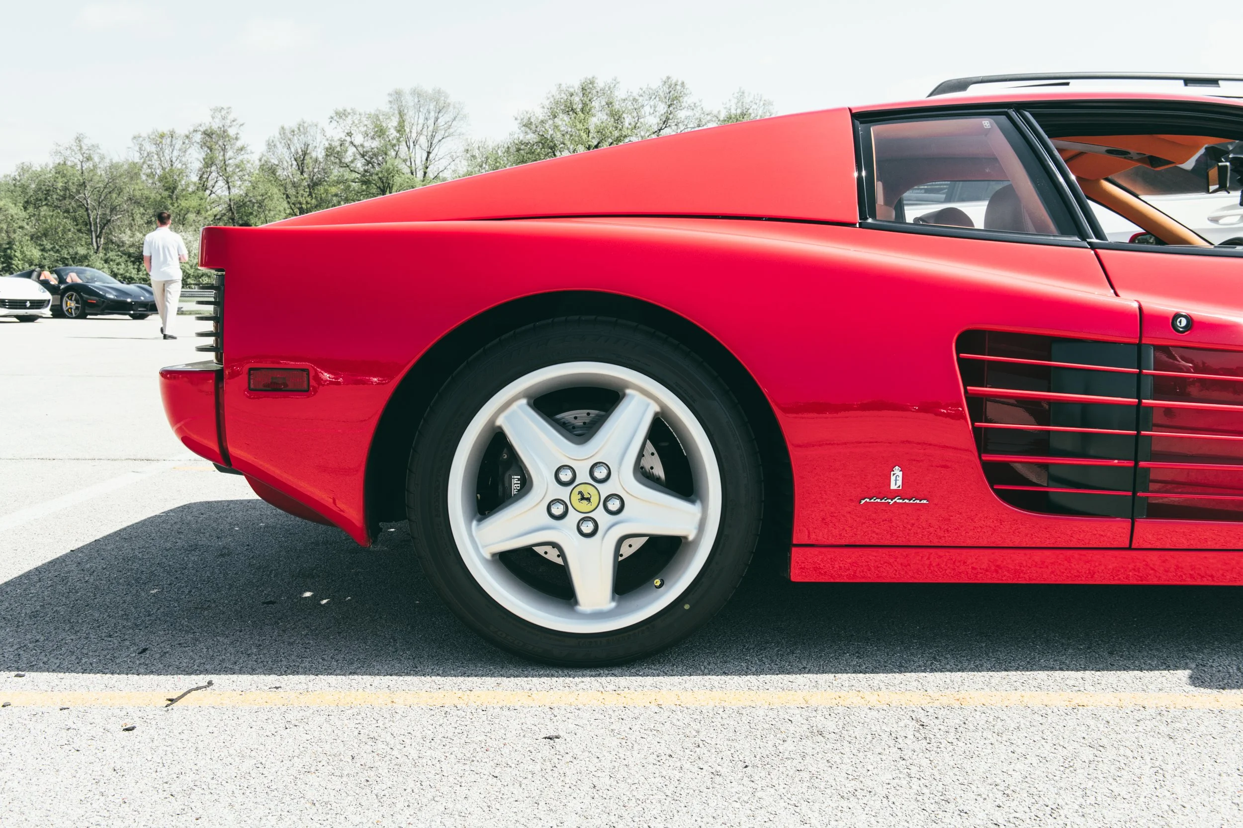 Red_Ferrari_512TR_at_Autobahn_Racetrack_Panning_DSLuxury_Field_Day.jpg