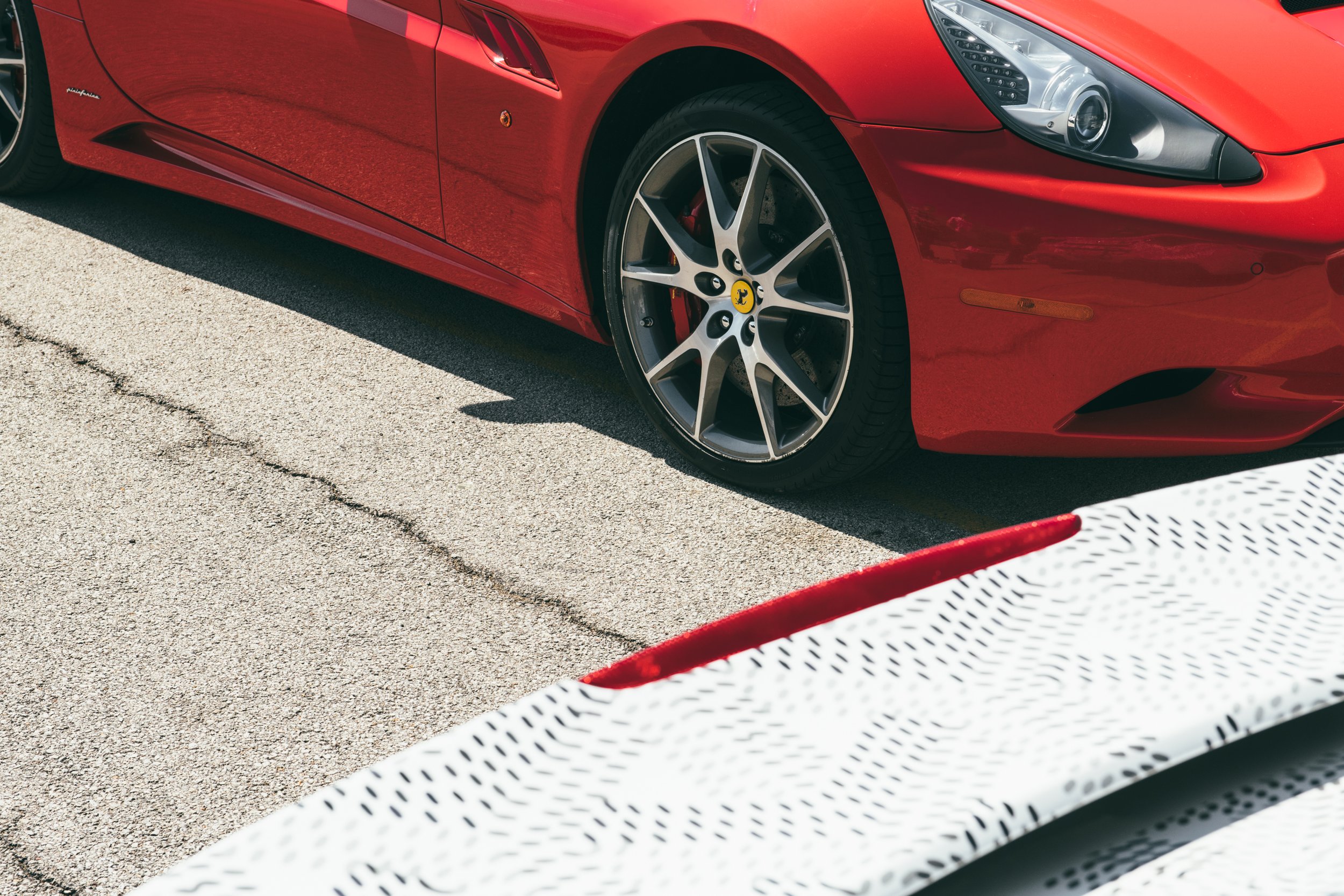Red_Ferrari_California_at_Autobahn_Racetrack_Wheel_DSLuxury_Field_Day.jpg