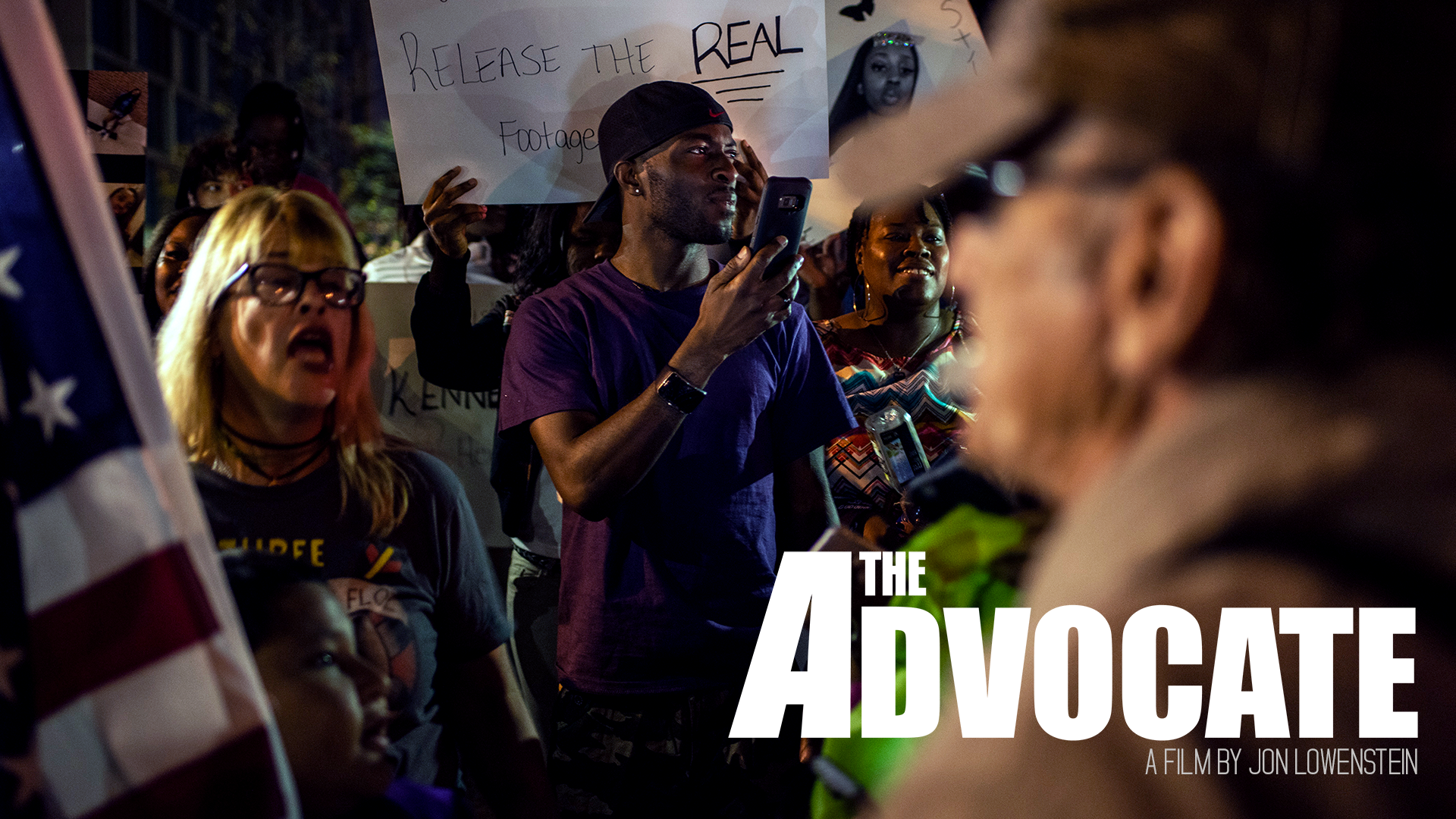 Jedidiah Brown communicates to his followers and collaborators over the phone during the protest seeking answers for Kenneka Jenkins in 2017. 