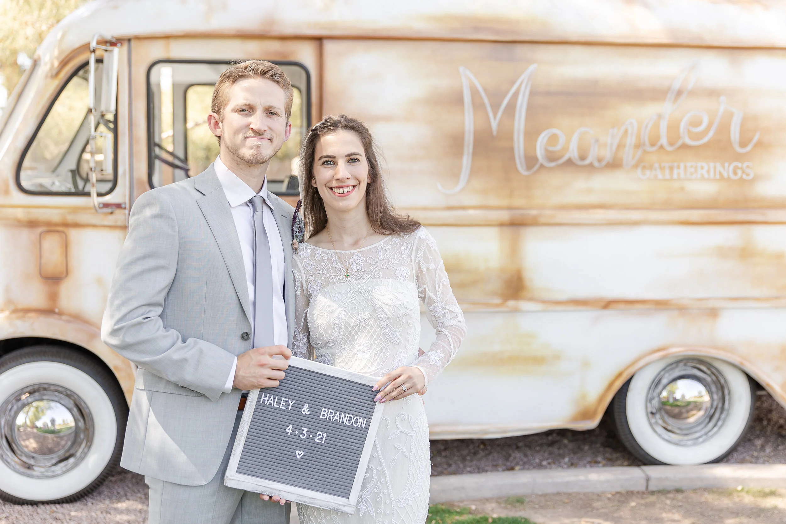 bride and groom with metro van