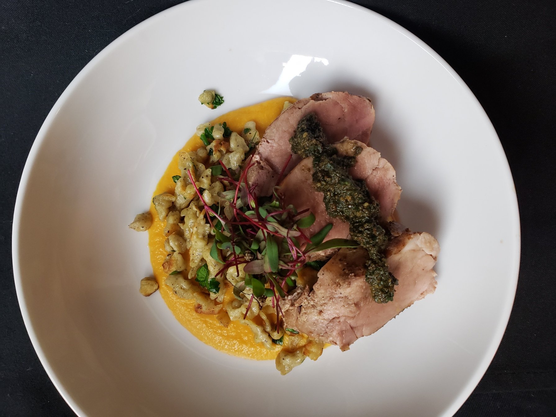 Bourbon + Cherry Glazed Pork Medallions with Buckwheat Spätzle, Sweet Potato Puree, and Pecan Pesto