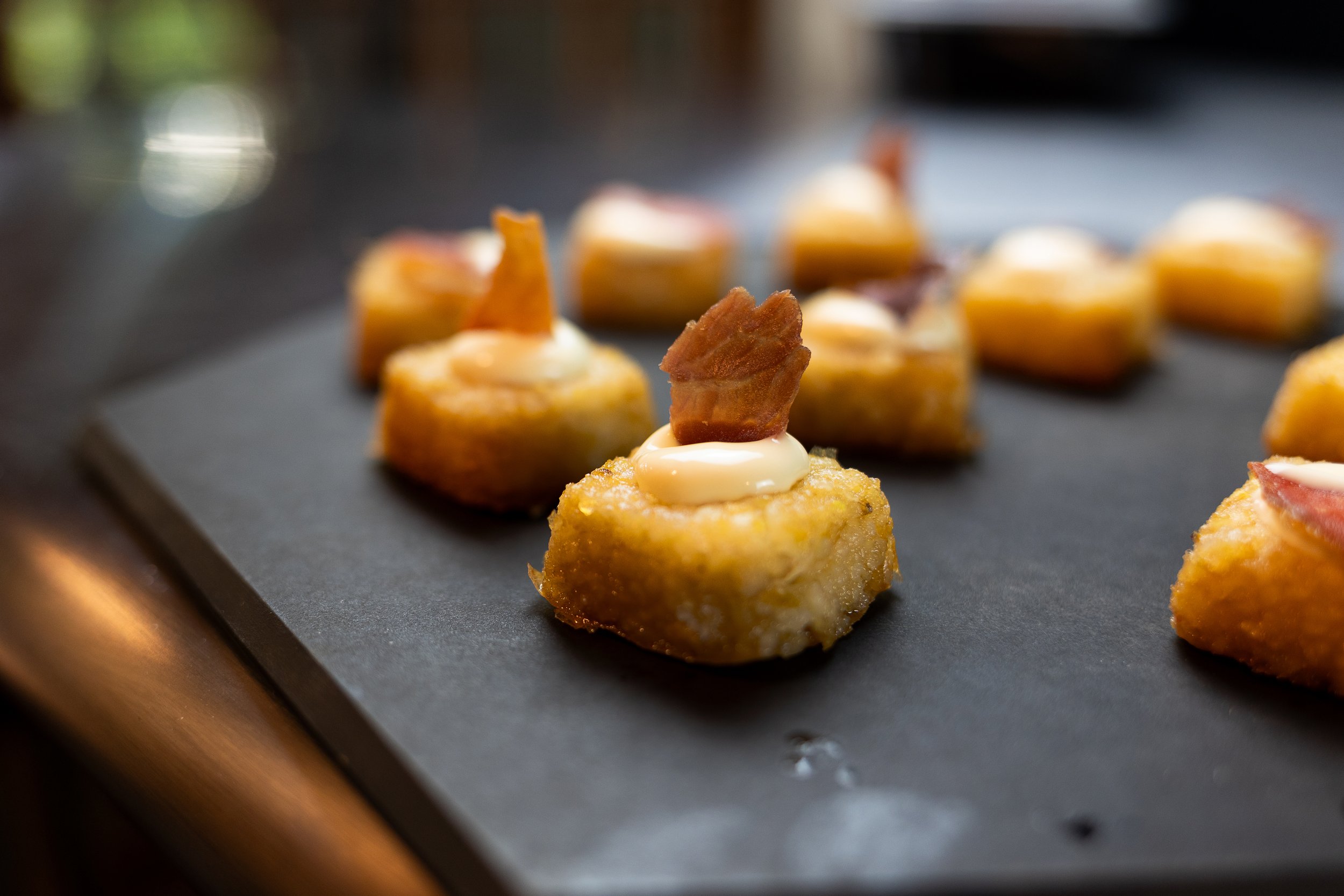Grit Cakes with Bourbon Aioli + Country Ham Chips