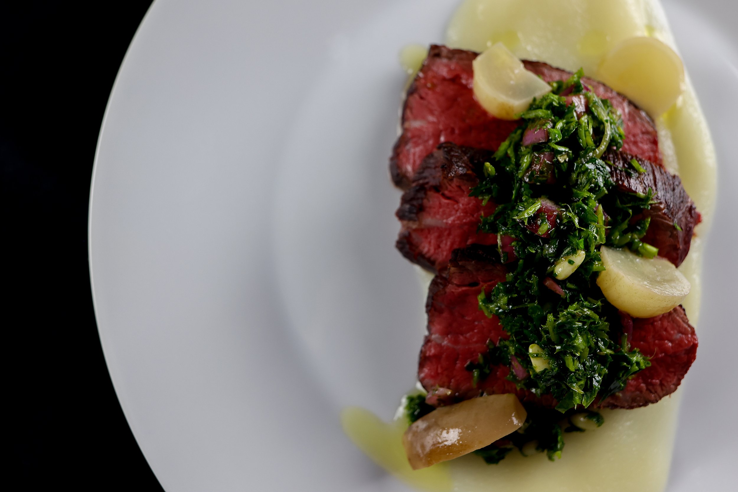 Chef's Cut Beef with Parsnip Puree, Pine Nut Gremolata + Radish Confit