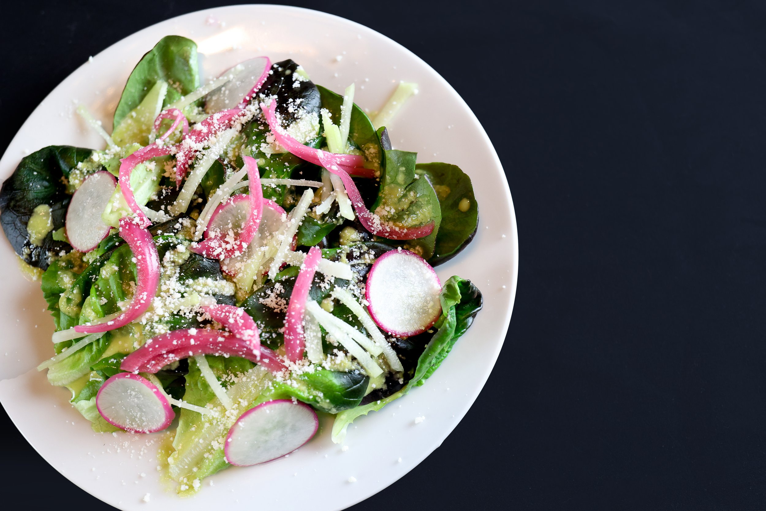 Mixed Greens with Poblano Vinaigrette, Chayote, Pepitas, + Cotija