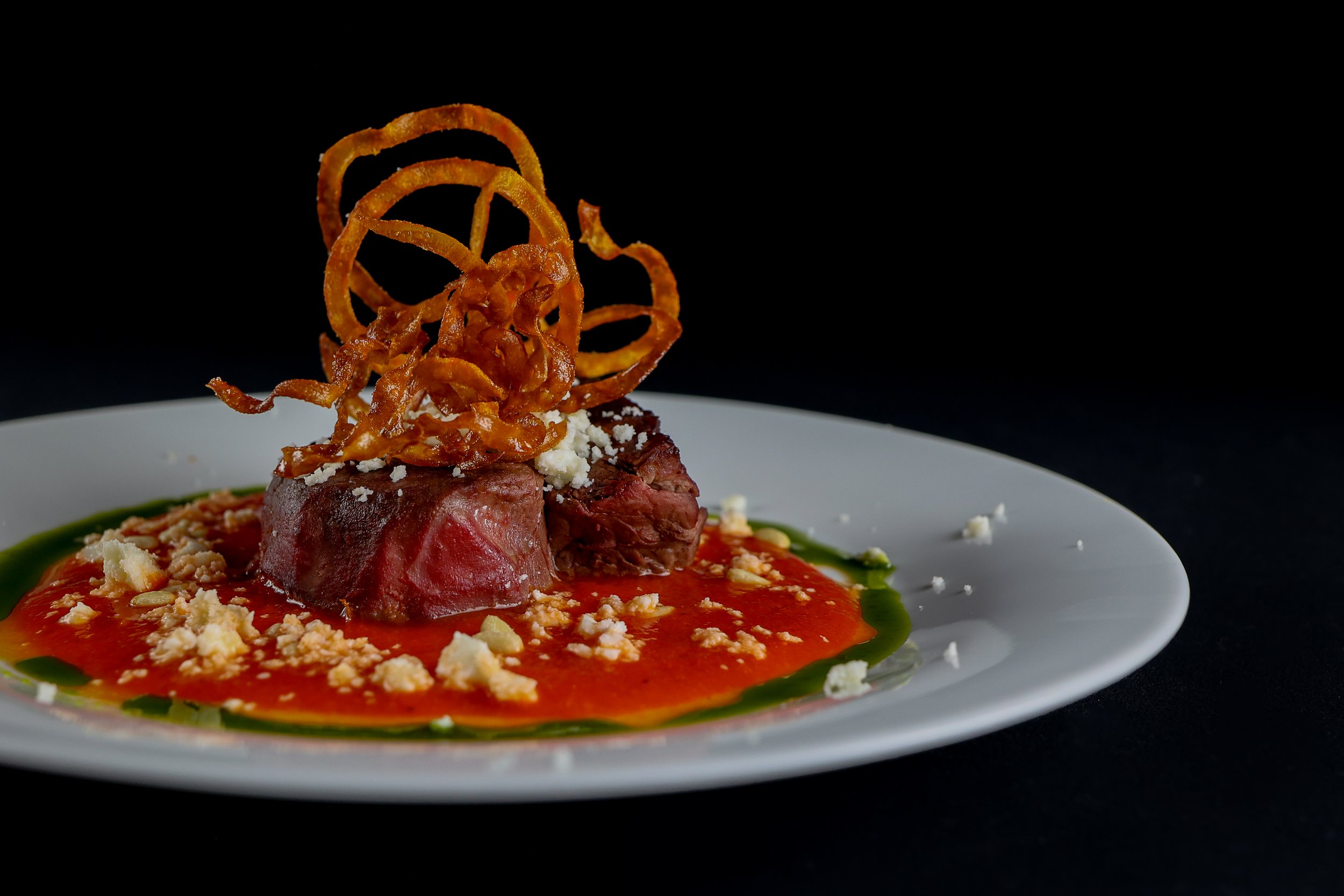 Black Pepper Crusted Filet of Beef, Ancho Rojo + Sweet Potato Nest