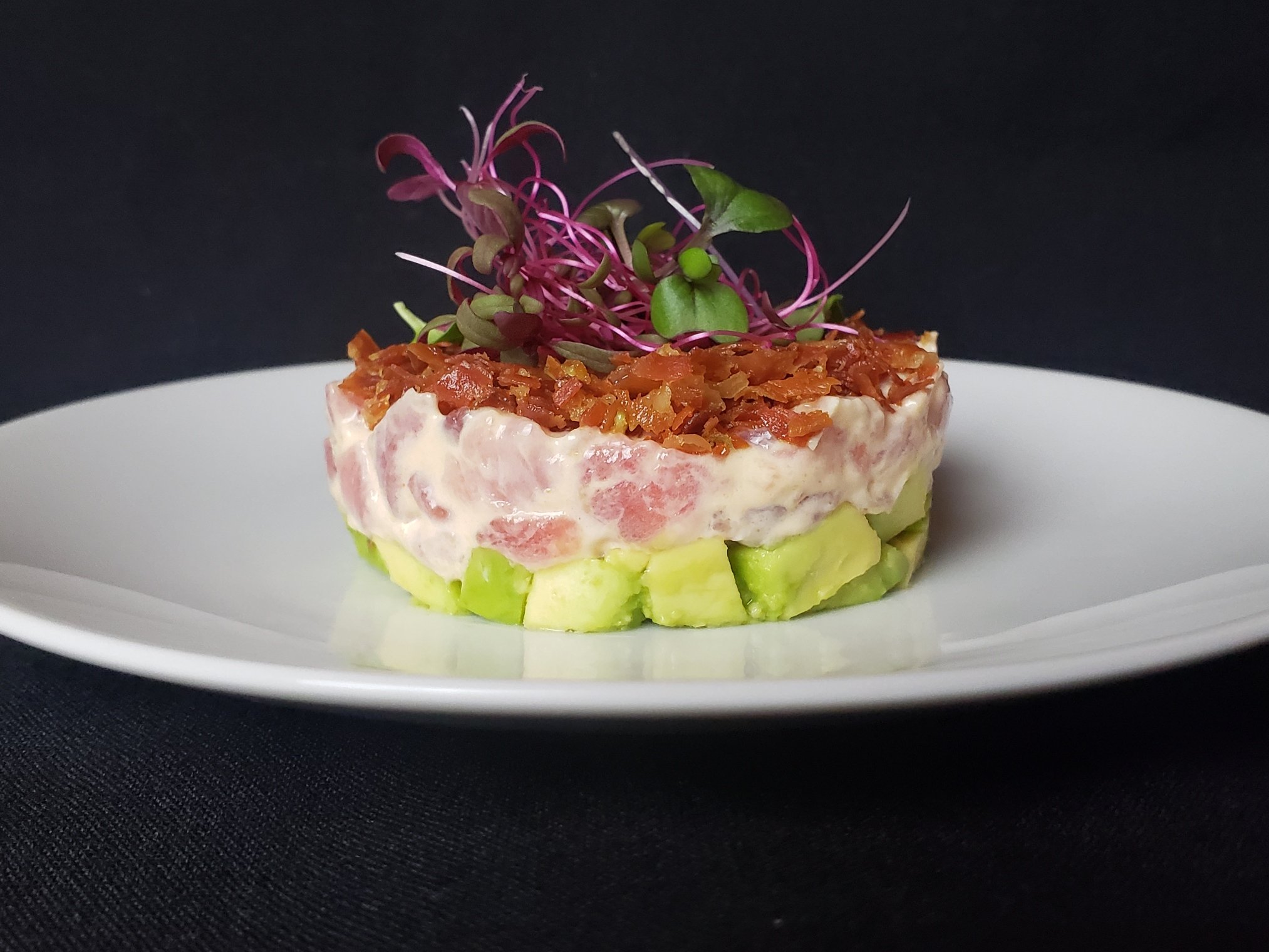 "Southern Ceviche" . Tuna tossed in a spicy bacon aioli topped with crispy country ham bits.