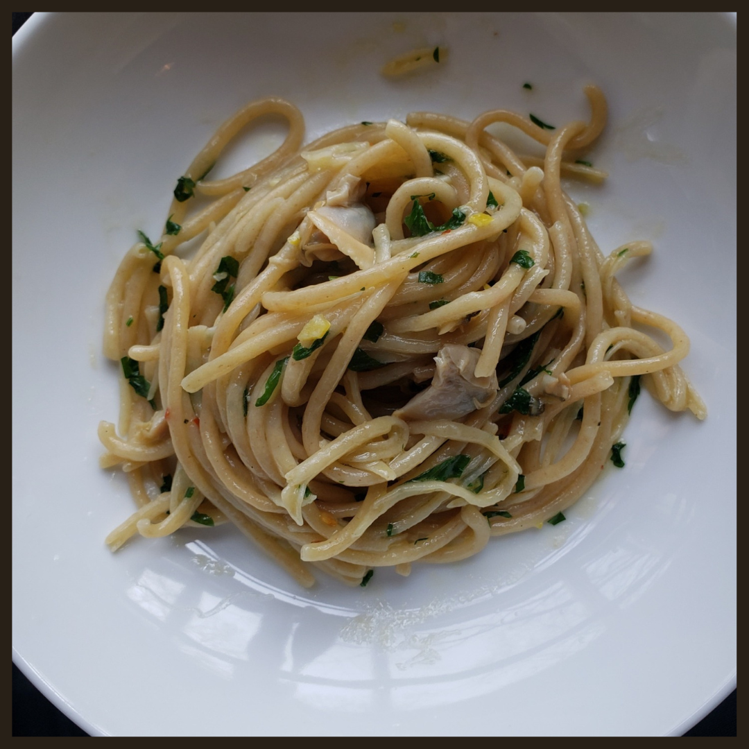 Bucatini Vongole. House-extruded pasta with clams, white wine and lemon.