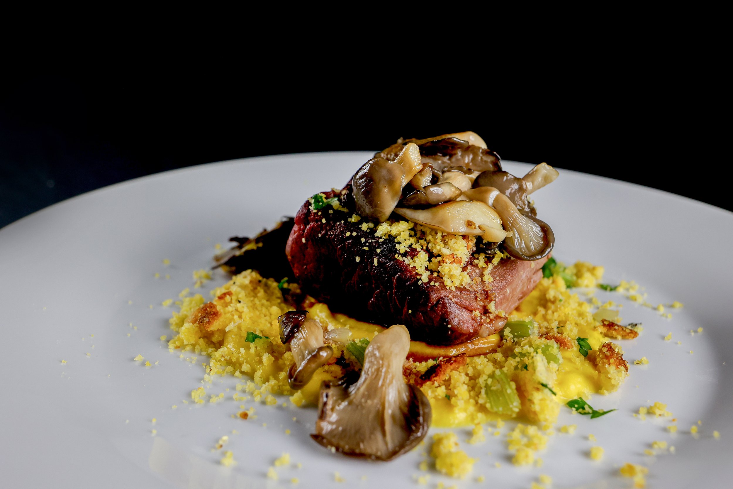 Slagel Farms Filet with Cornbread Stuffing, Roasted Mushrooms, + Red Wine Reduction