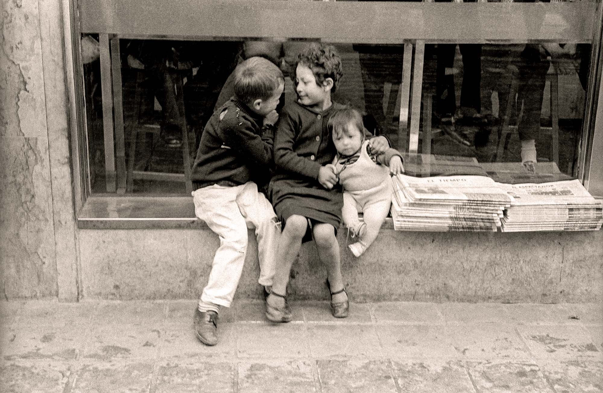 Three Kids and Newspapers