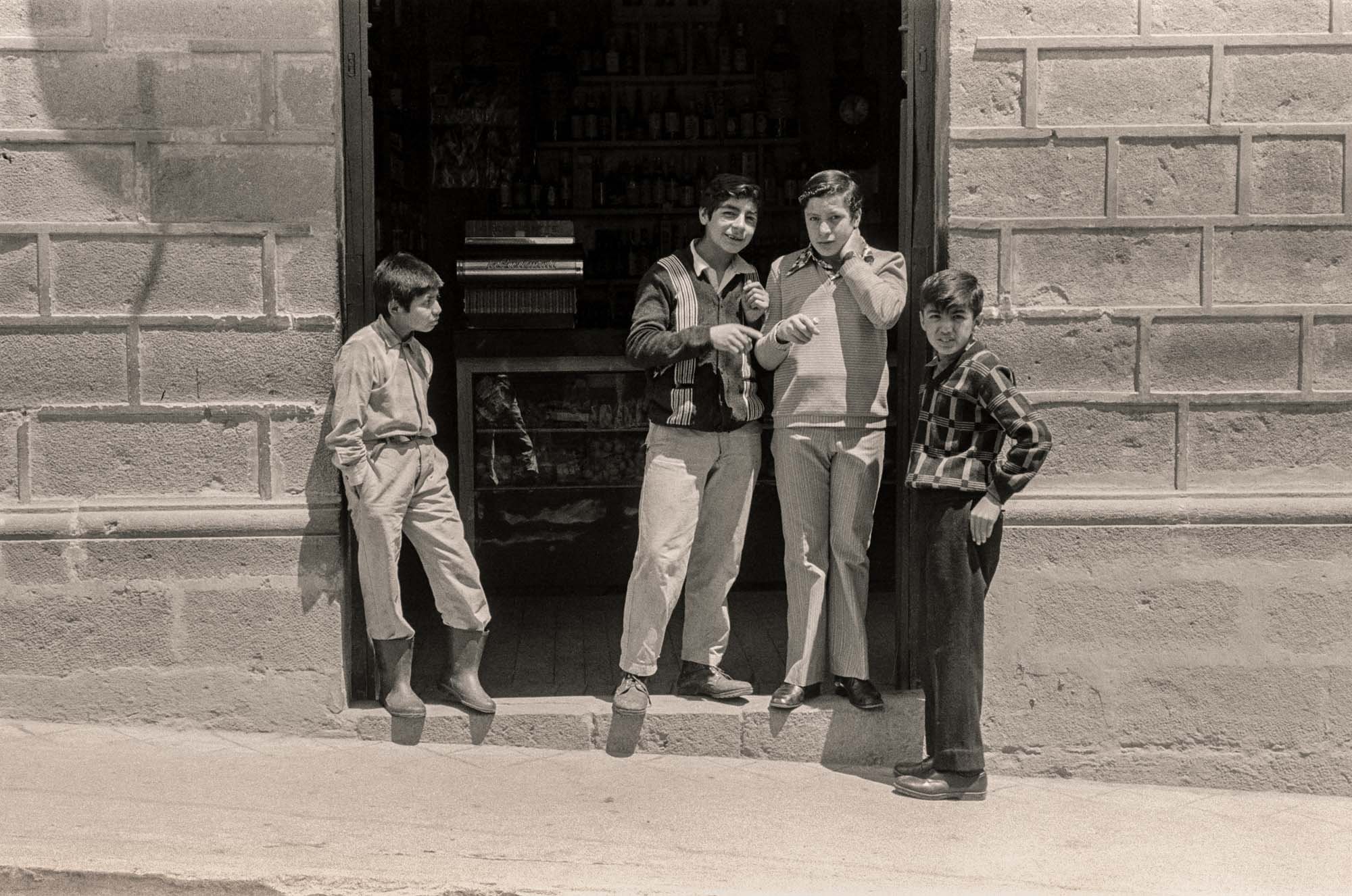 Boys in Store Doorway