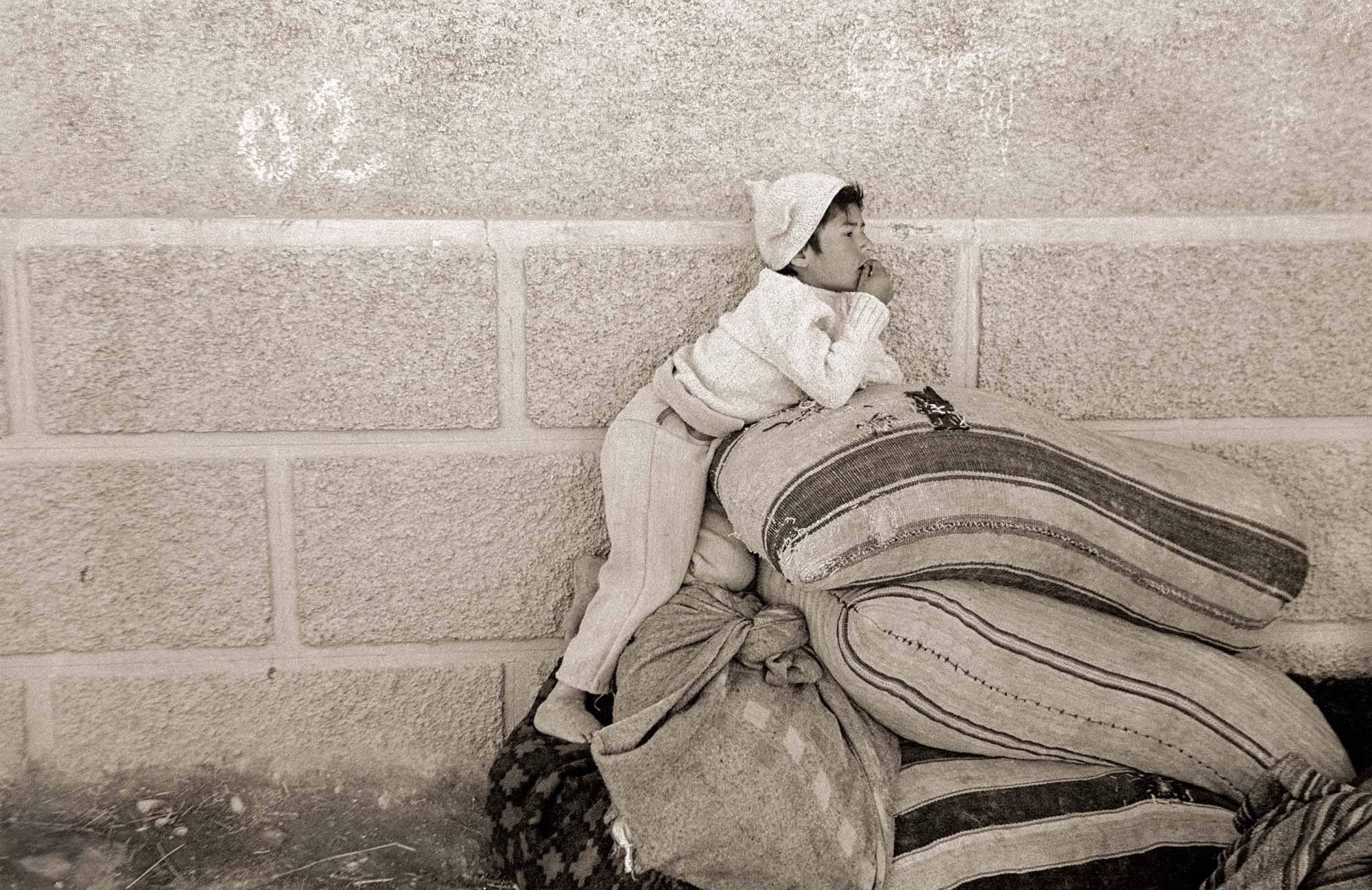 Boy on Grain Sacks