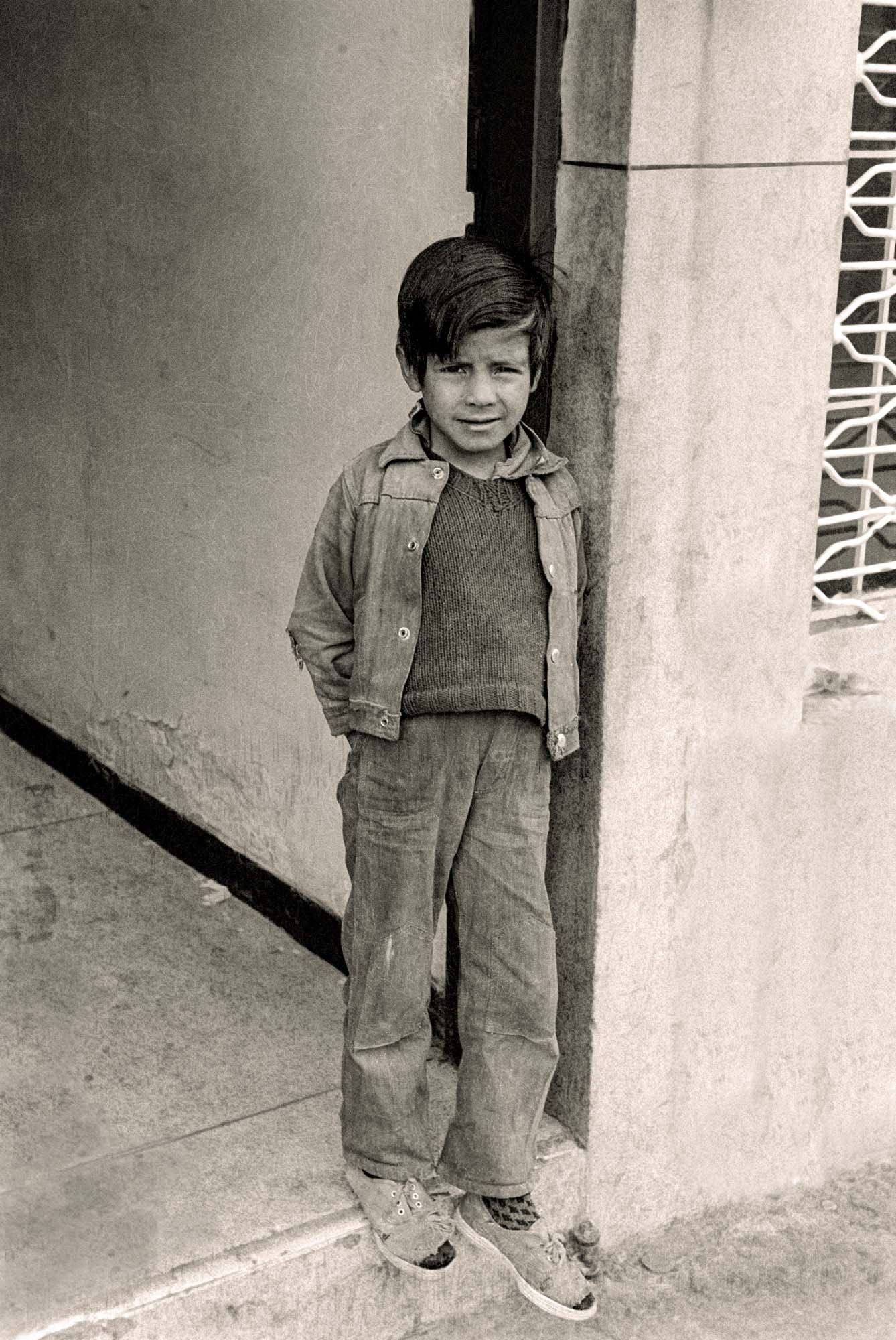 Boy, Standing in a Doorway