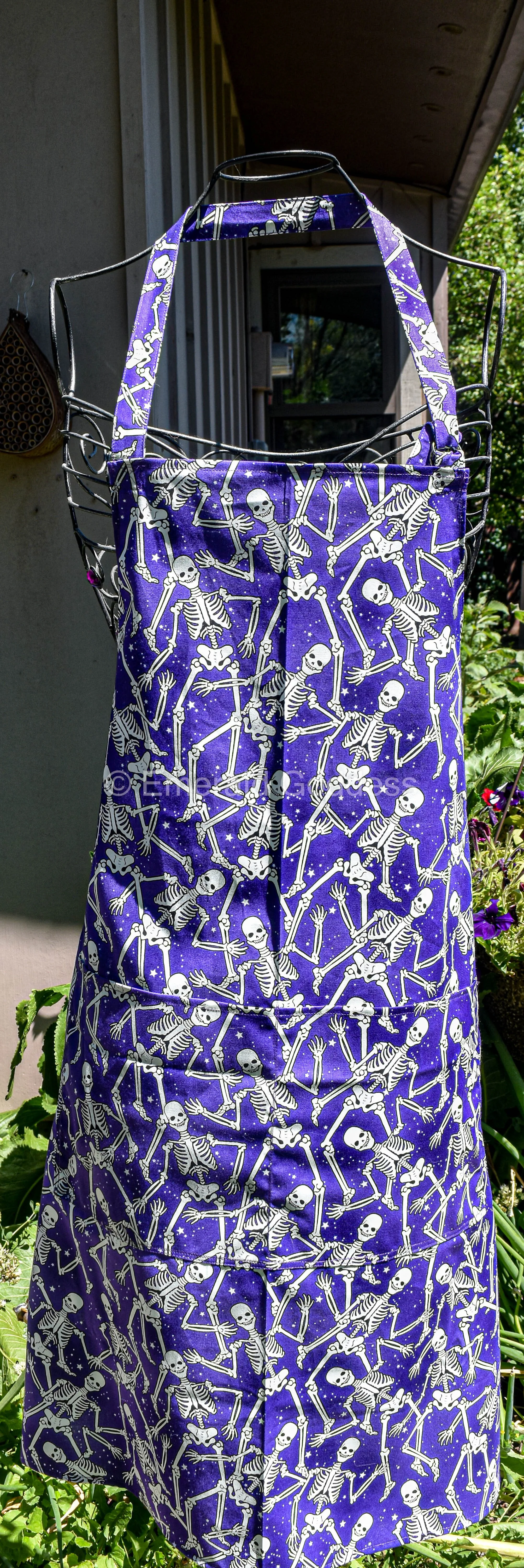 Skeletons on Purple Apron
