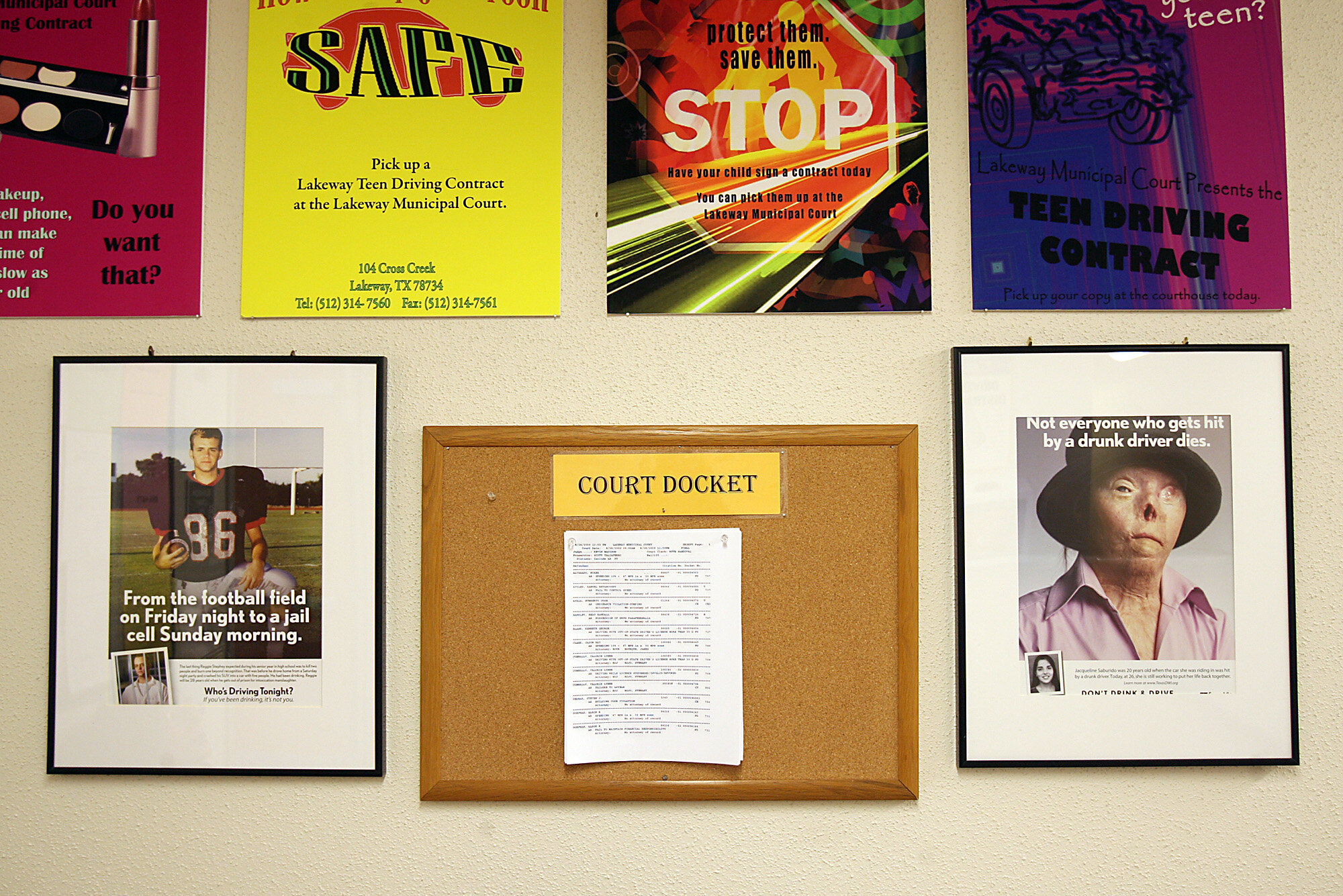  Posters of Reggie Stephey,  and Jacqui Saburido, share a wall, on outside of the Lakeway Municipal Court, hometown of Stephey.   