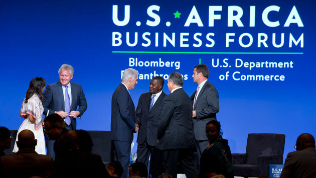 Bill Clinton shakes hands with US and African business leaders at the African Business Forum in Washington, DC. Doug McMillon, CEO of Walmart, is on the far right. Jacquelyn Martin/AP