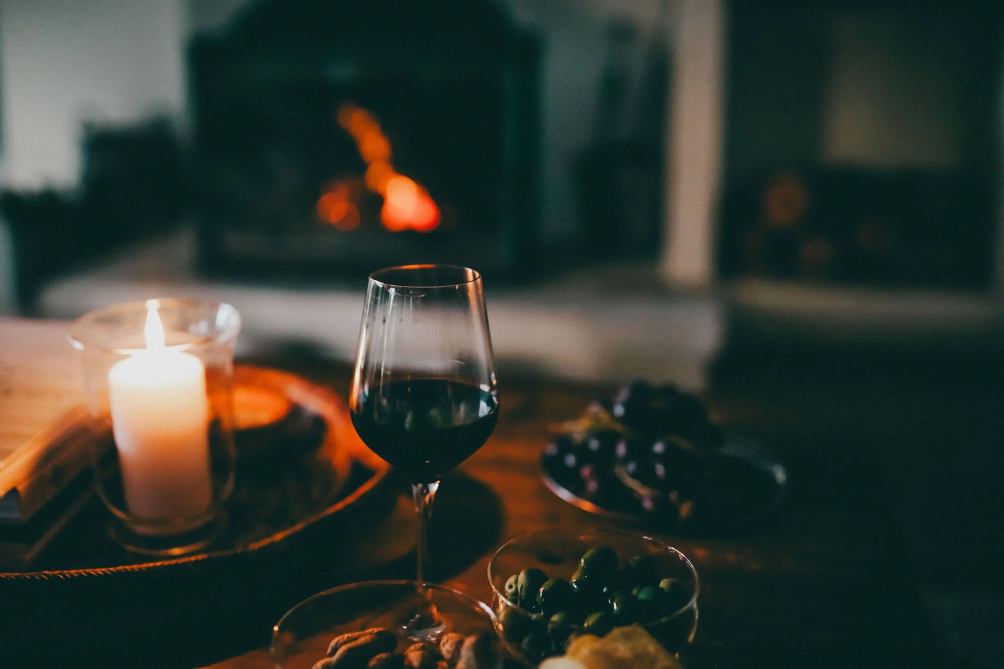 Grazing board and wine by the fireplace at Verandah Retreat