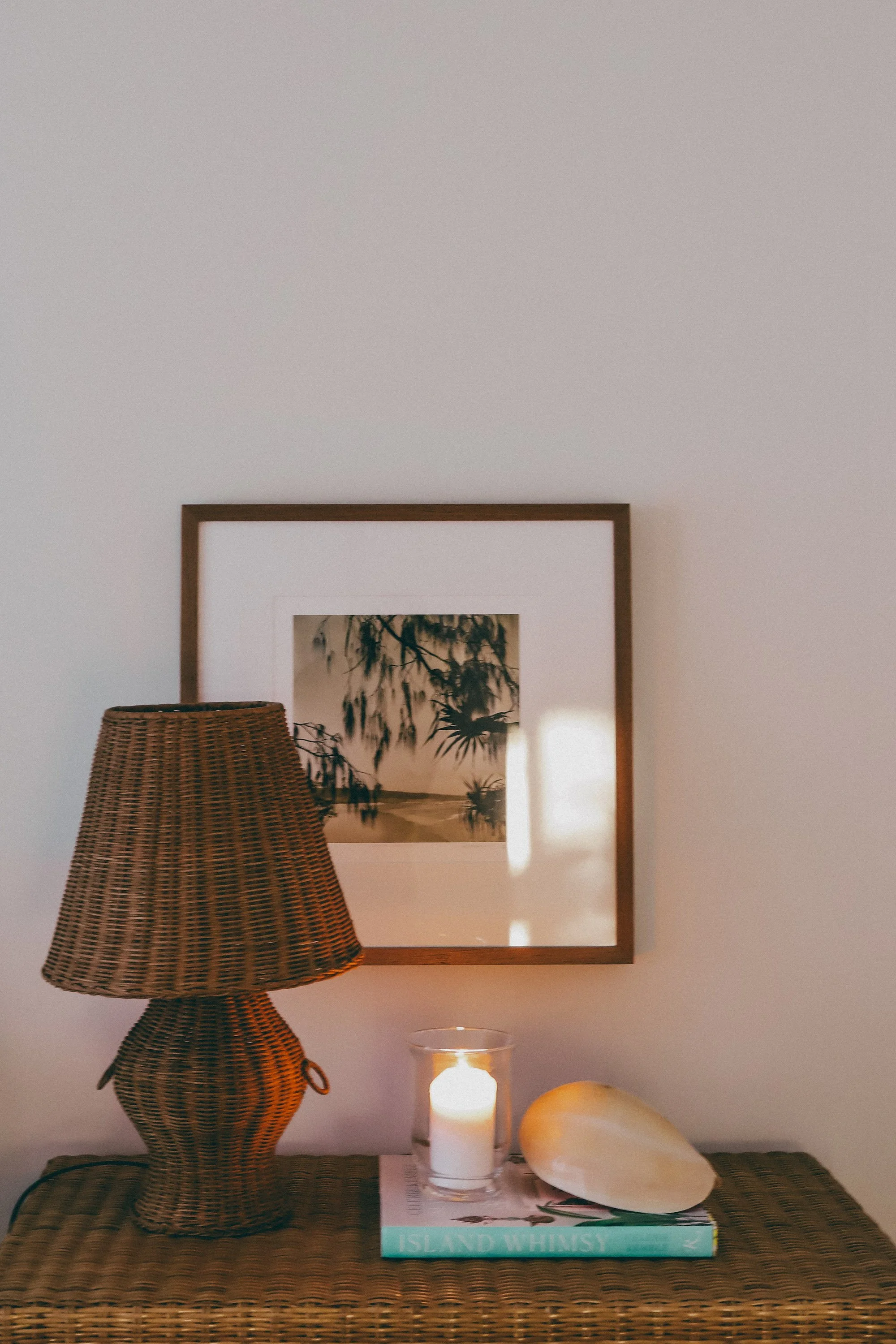 bedroom corner candle light shell and book.jpg