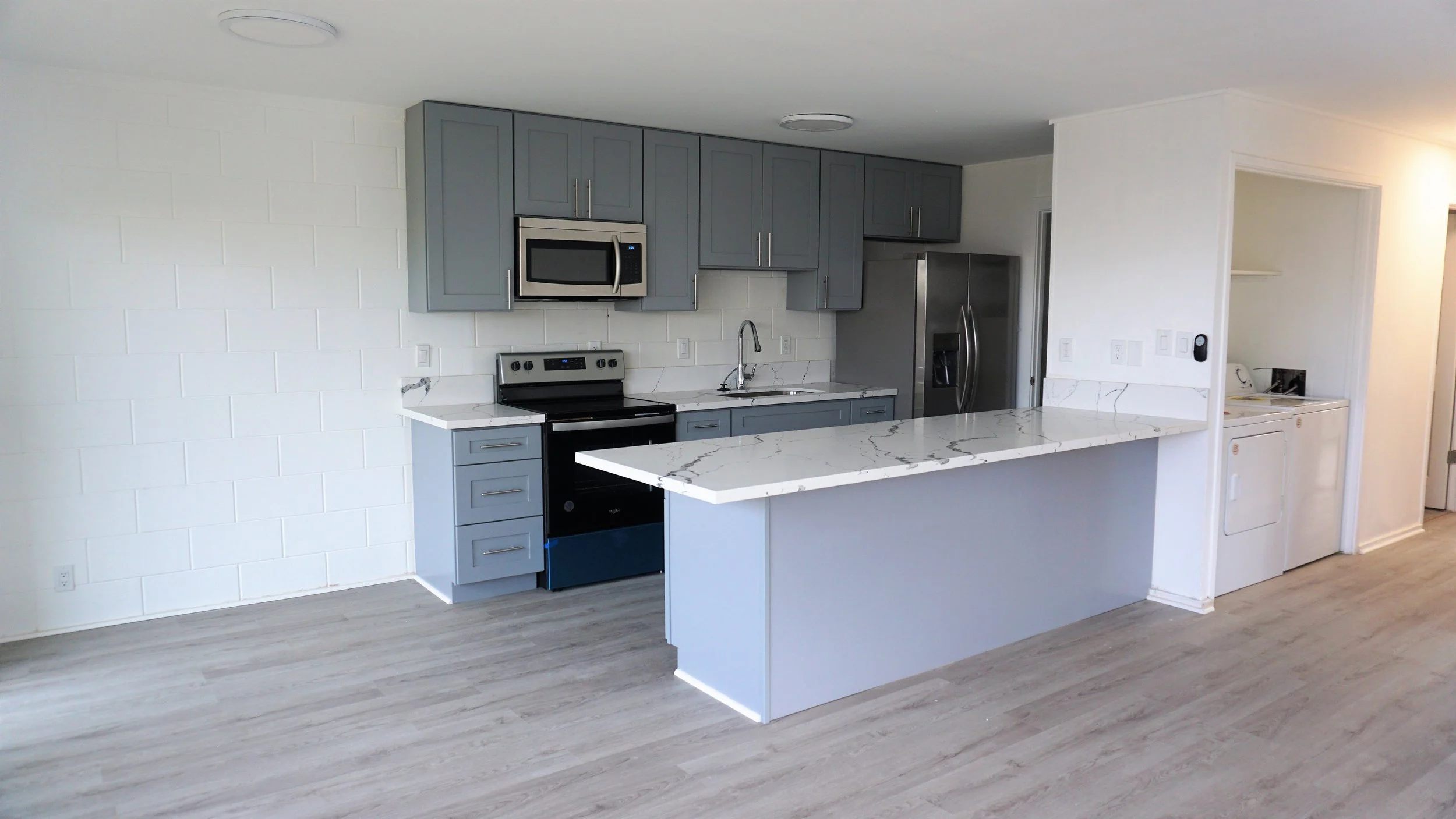 Copy of kitchen view 3 with laundry.jpg