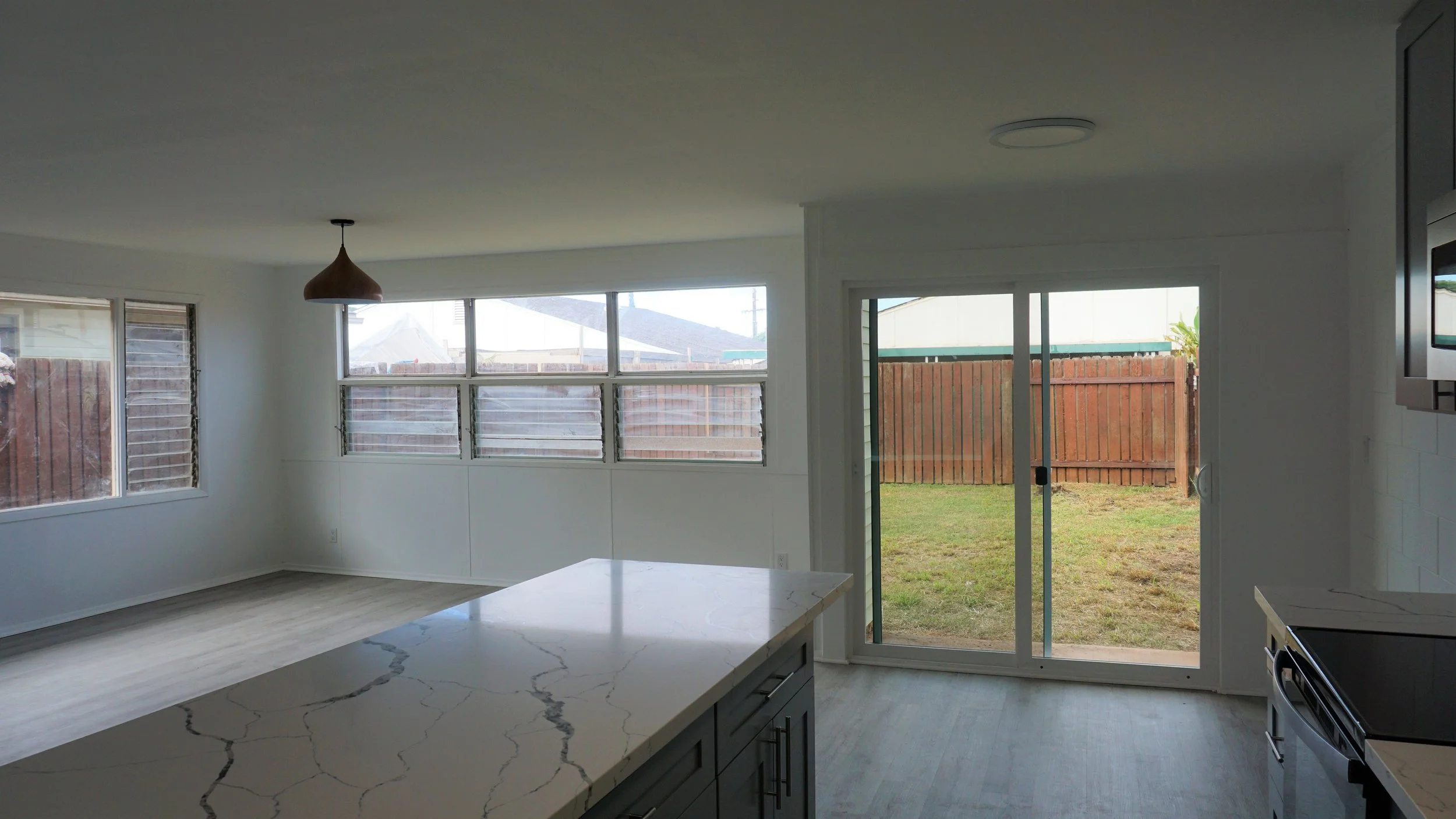 Copy of living room, kitchen and yard view.jpg