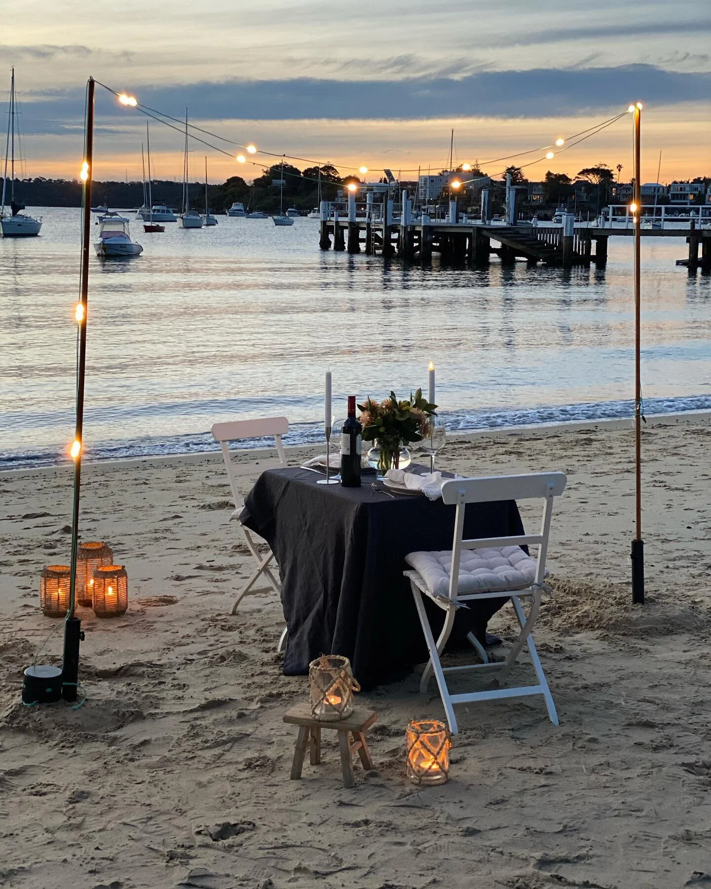 What a beautiful night for dinner on the beach😍