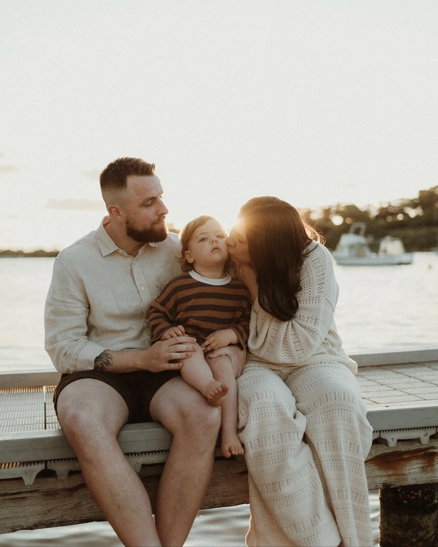 Down by the river with this beautiful family, soaking up the last moments as three before they become four. The sweetest curls, soft light, and a mama&rsquo;s glow that says love is growing 🐚