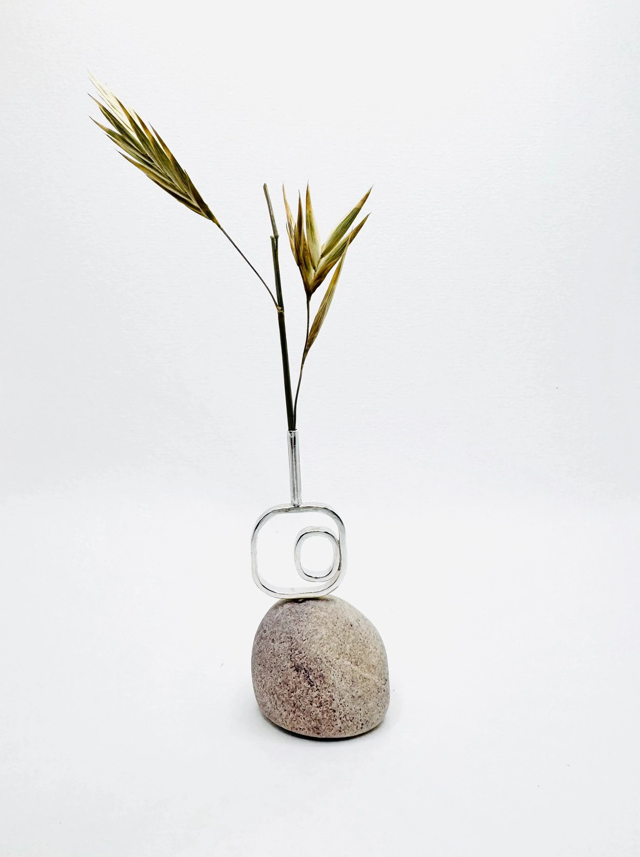 "Journey" pebble and silver sculpture vase