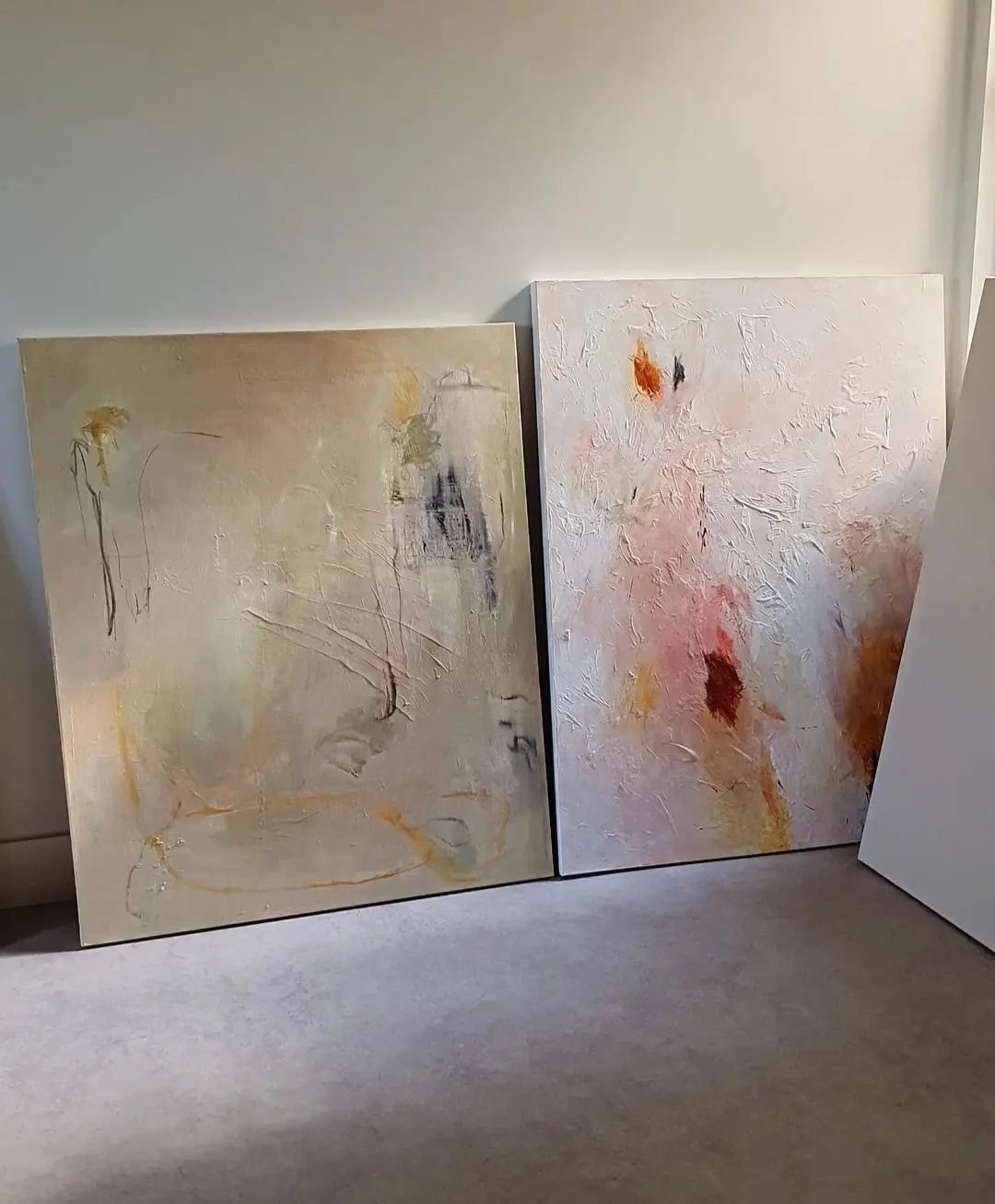 Anna Curnuck Studio view.

There She Is There She Goes,  mixed media on canvas, unframed (on right) and Bedouin Sands oil on canvas, now framed in fine matt champagne gold (on left)